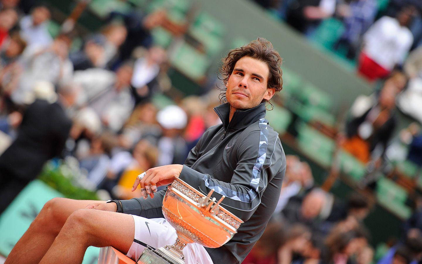 Rafael Nadal With French Open Trophy Background