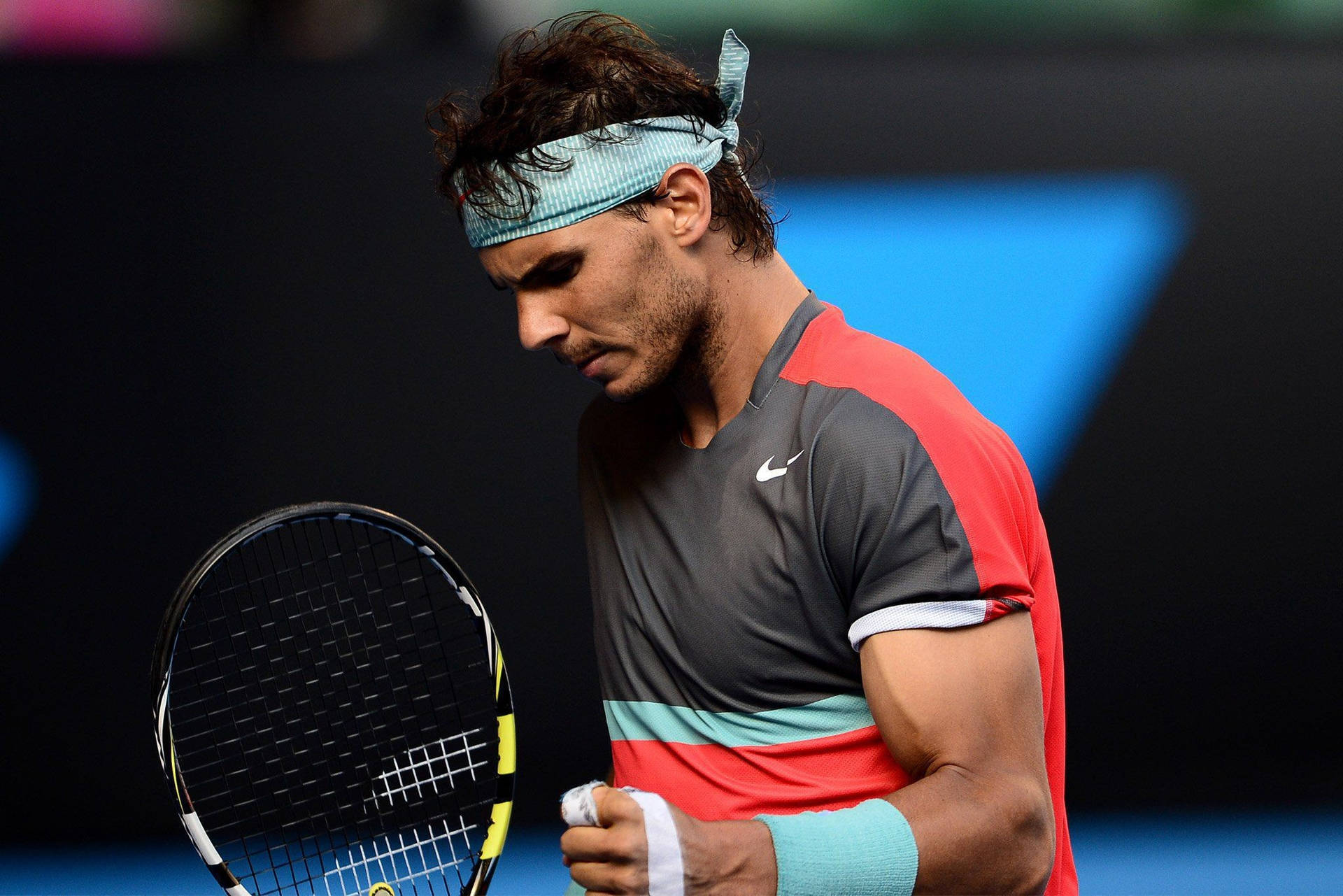 Rafael Nadal With Head Bow Background