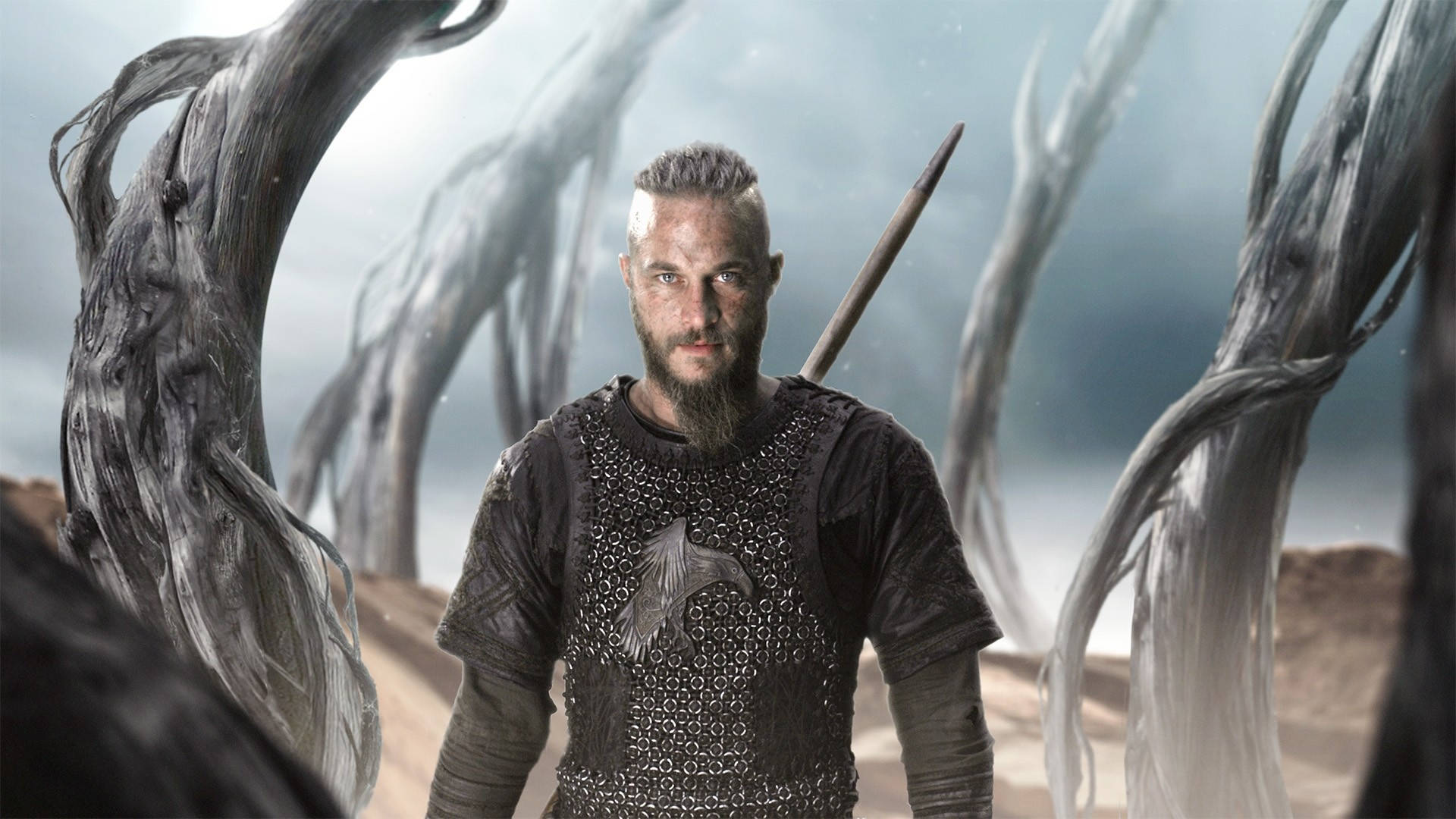 Ragnar Lothbrok From Vikings Before Trees Background