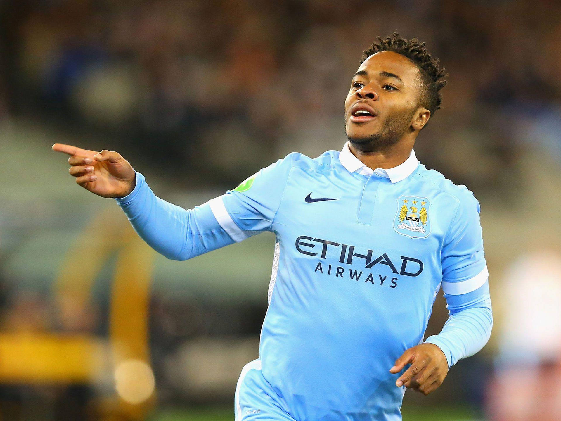 Raheem Sterling In Aqua Blue Jersey Background