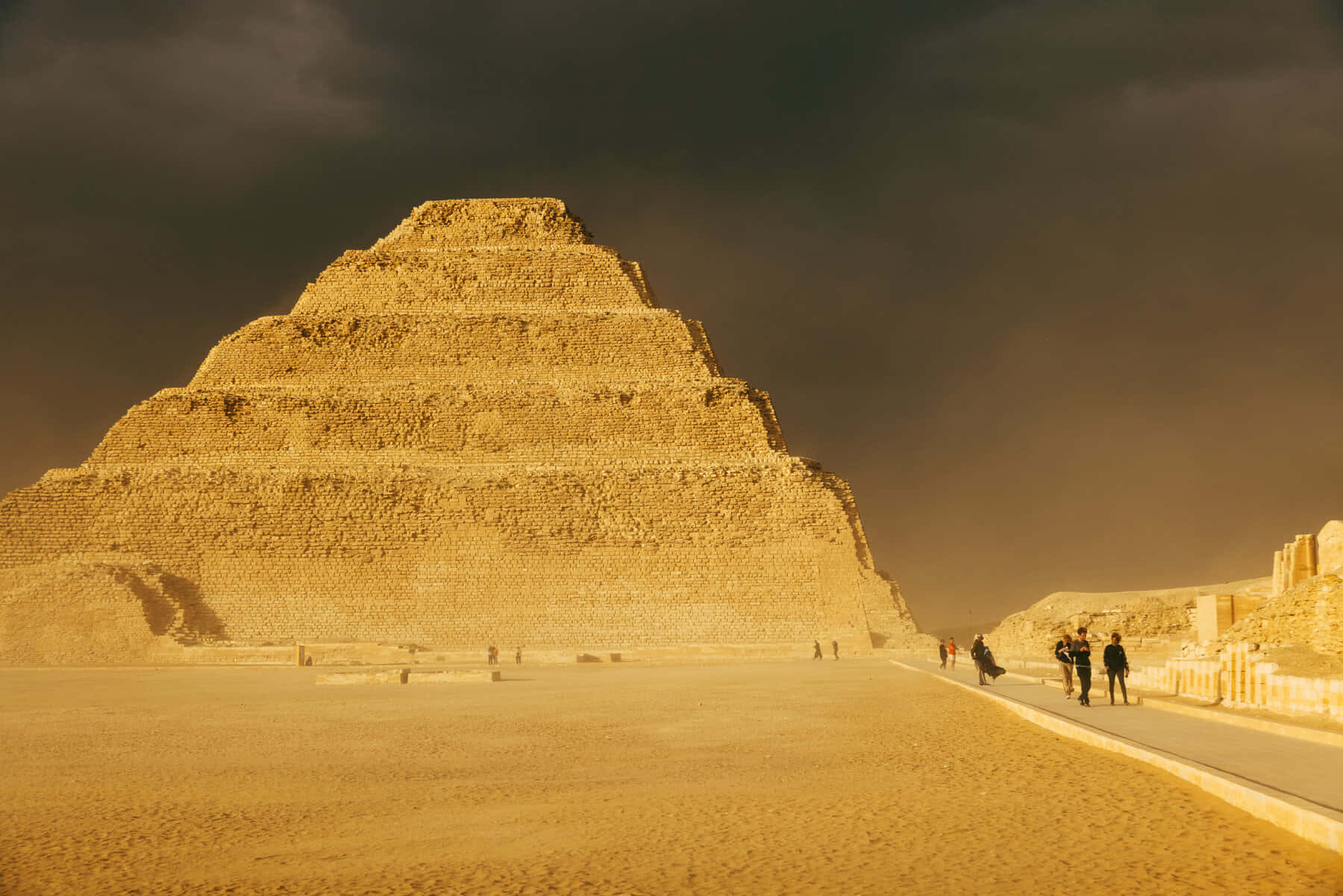 Rain Clouds Over Saqqara Pyramid Background