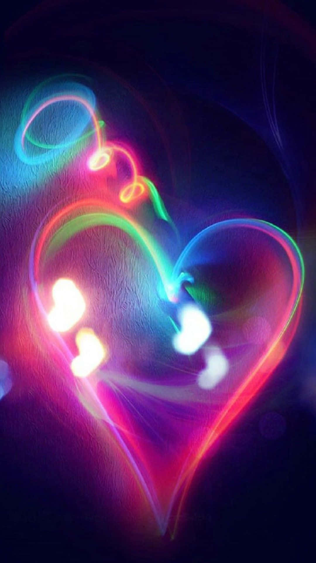 Rainbow Colored Neon Heart Light Writing Photograph Background