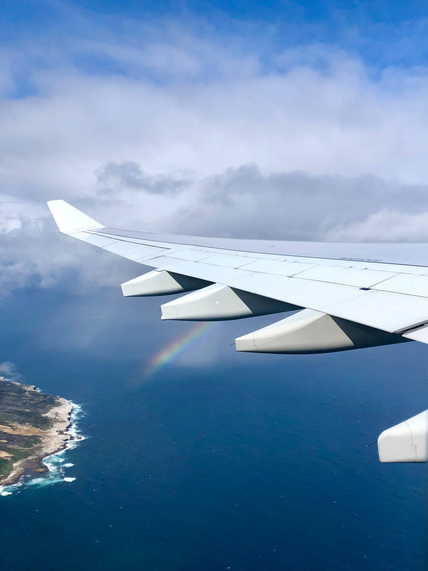 Rainbow On Plane Wing Background