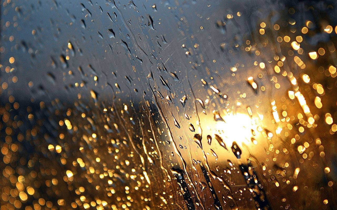 Raindrops On Glass With Light Reflection Background