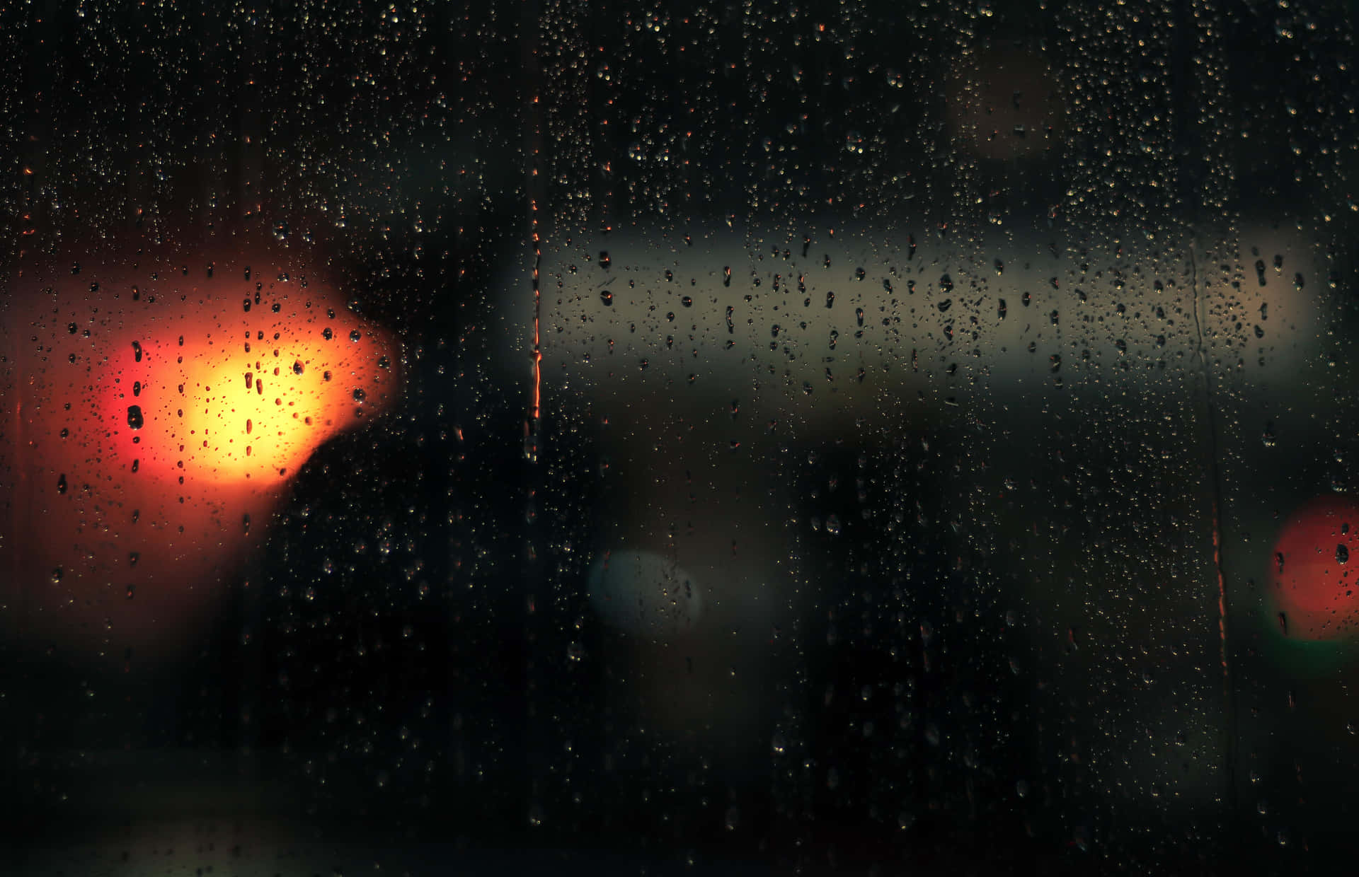 Rainy_ Night_ Blurred_ Lights_ Background Background
