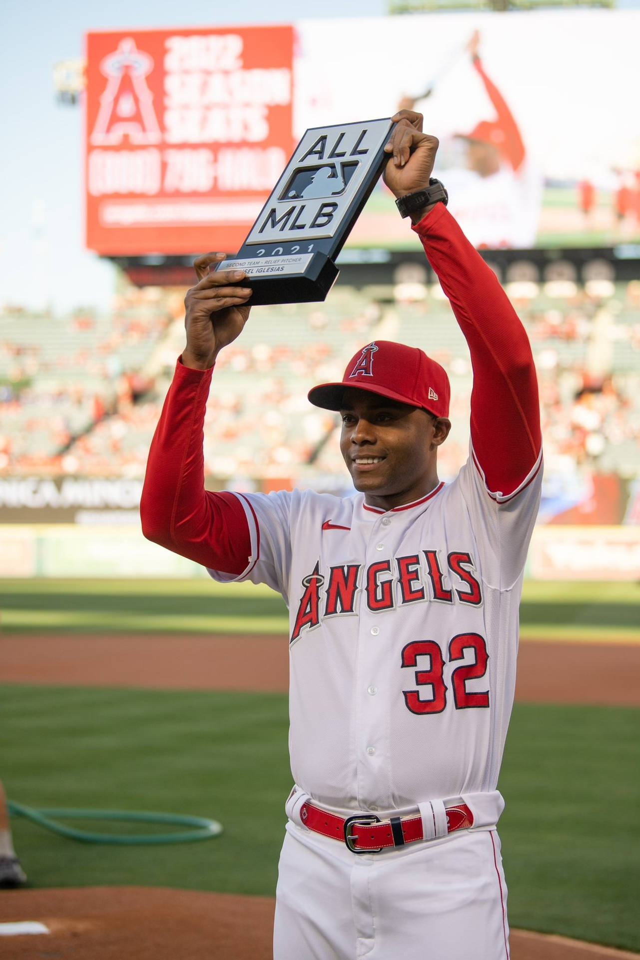 Raisel Iglesias In Action During A Baseball Game Background