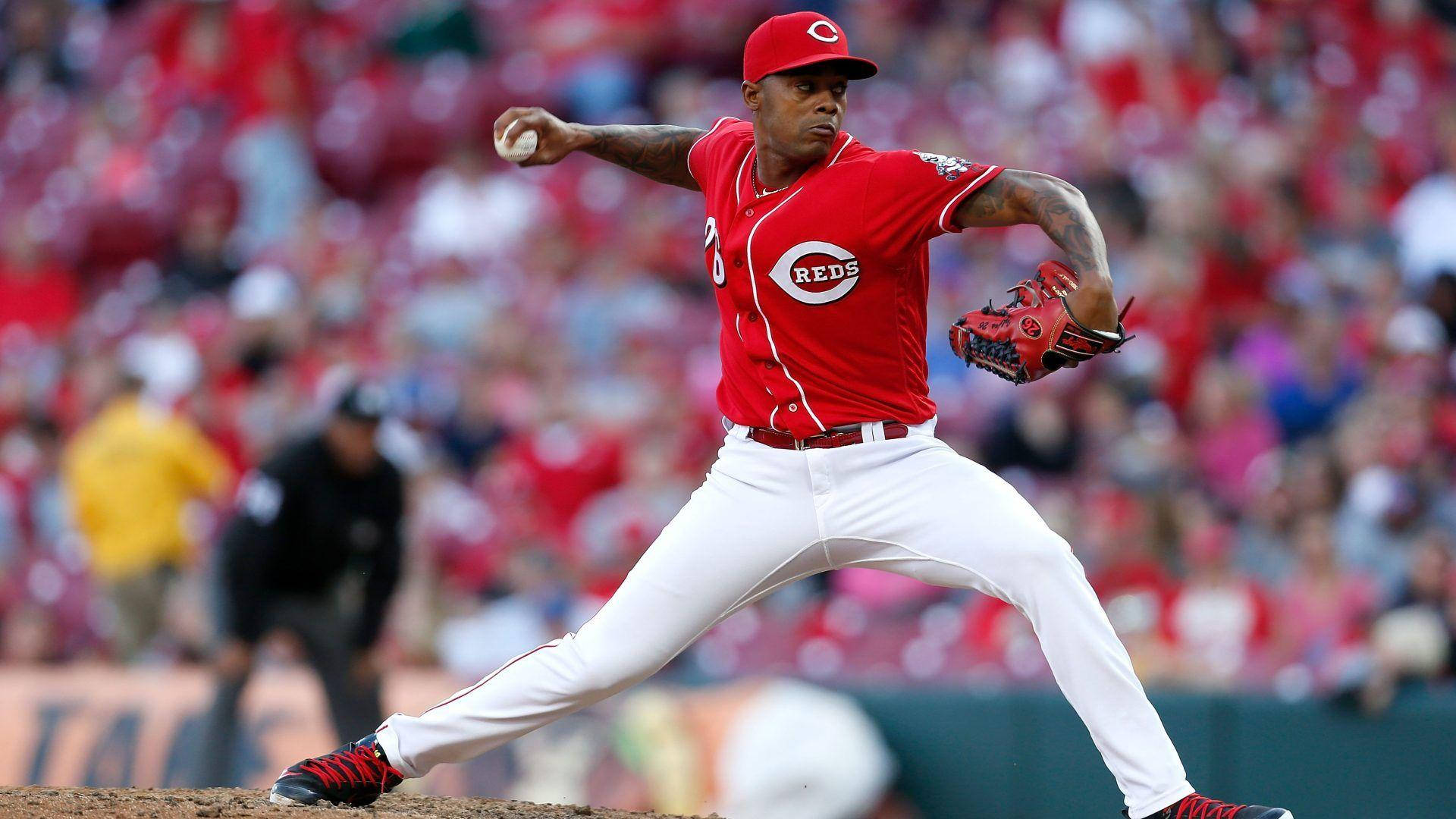 Raisel Iglesias In Action On The Pitch Background