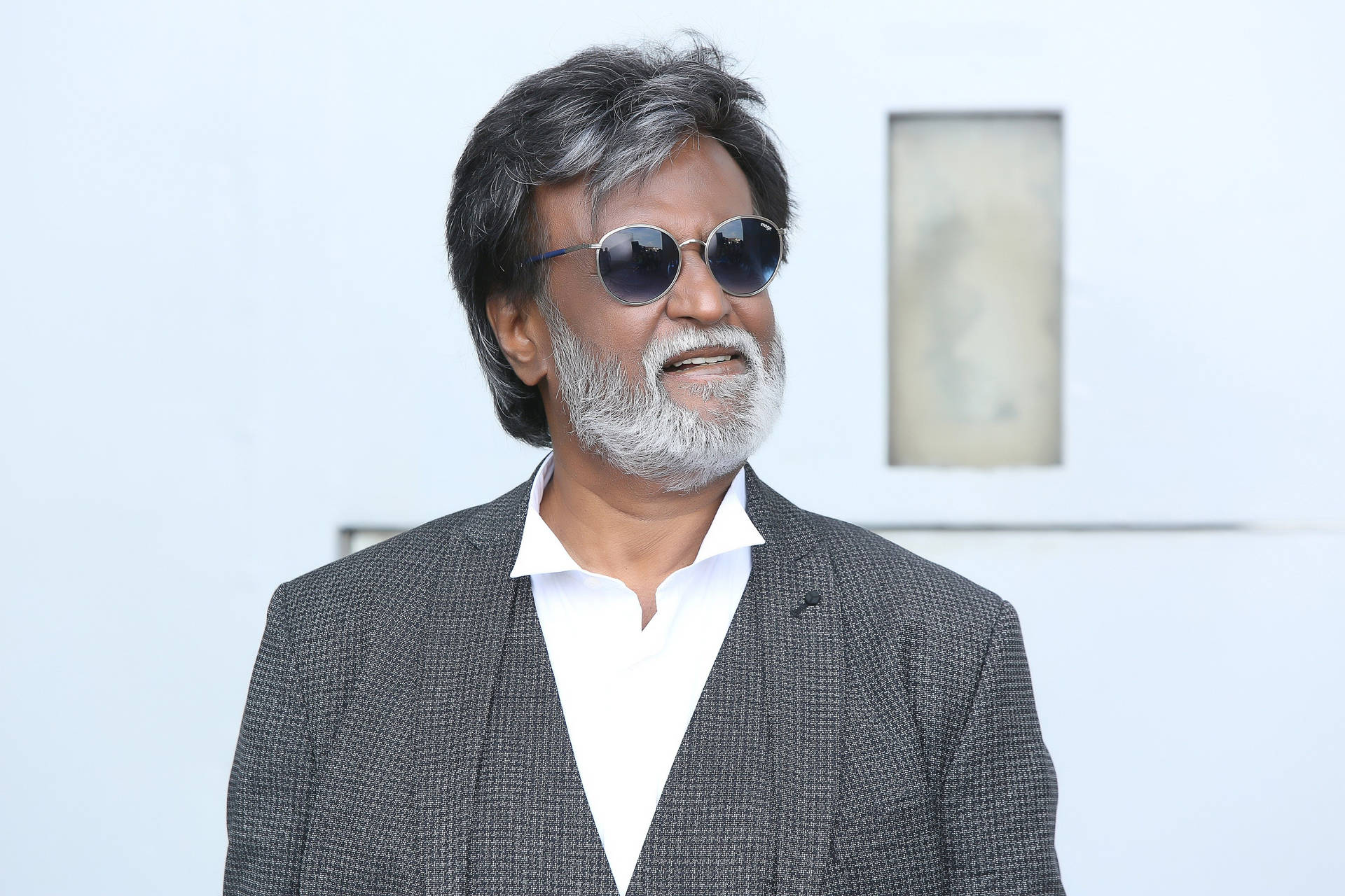 Rajinikanth Rocking Grey Suit Background