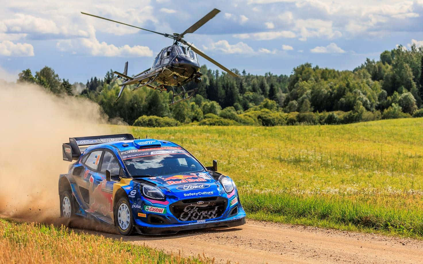 Rally_ Car_and_ Helicopter_in_ Action.jpg Background