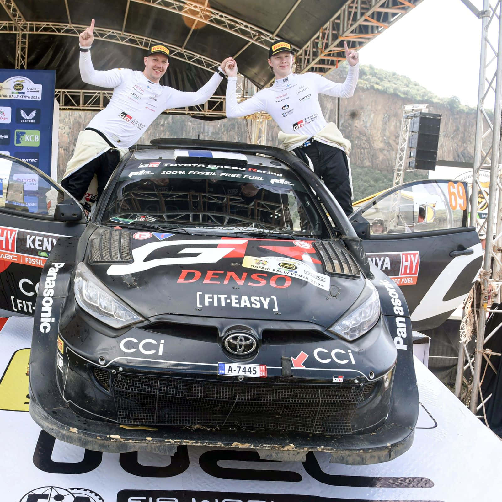 Rally Team Celebrationon Podium Background