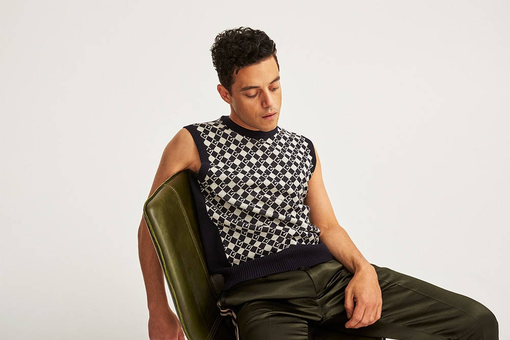 Rami Malek In Sleeveless Shirt Background