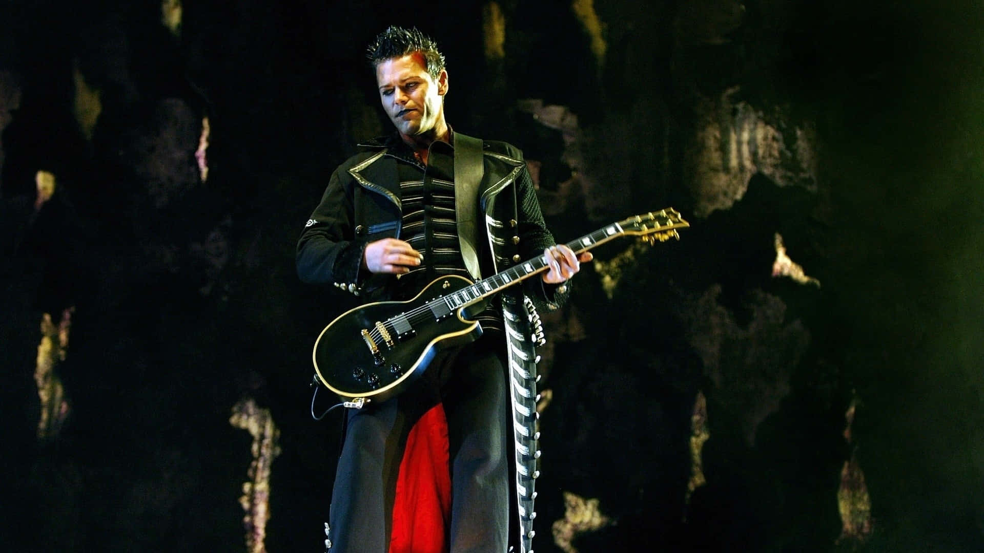 Rammstein Guitarist On Stage Background