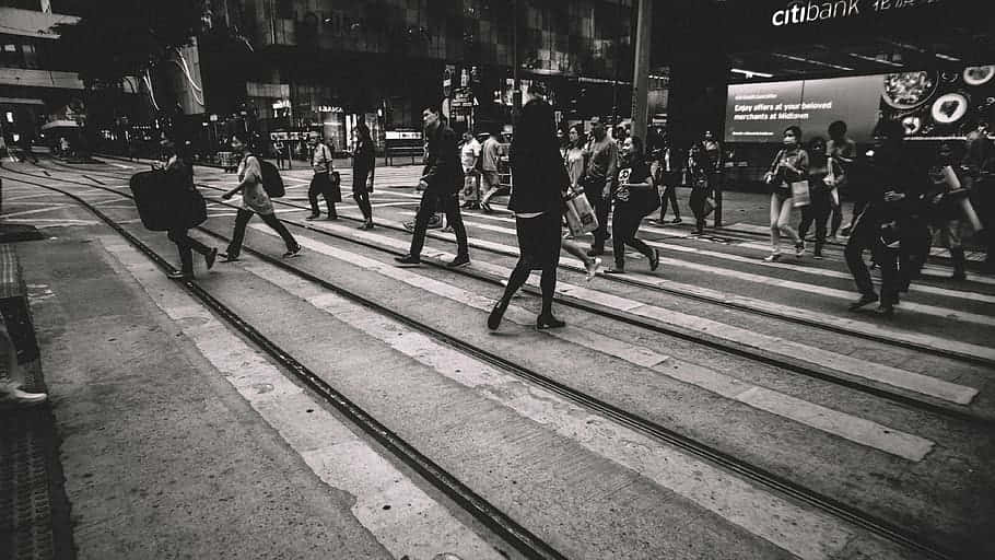 Random People Walking On Pedestrian Lane Background