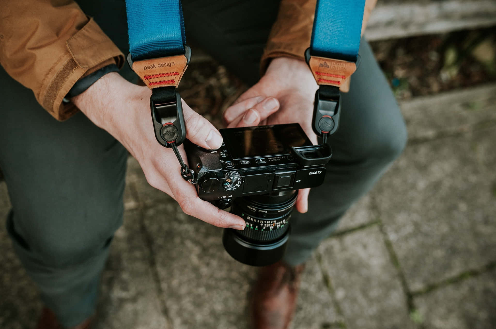 Random Person Holding Digital Camera Background