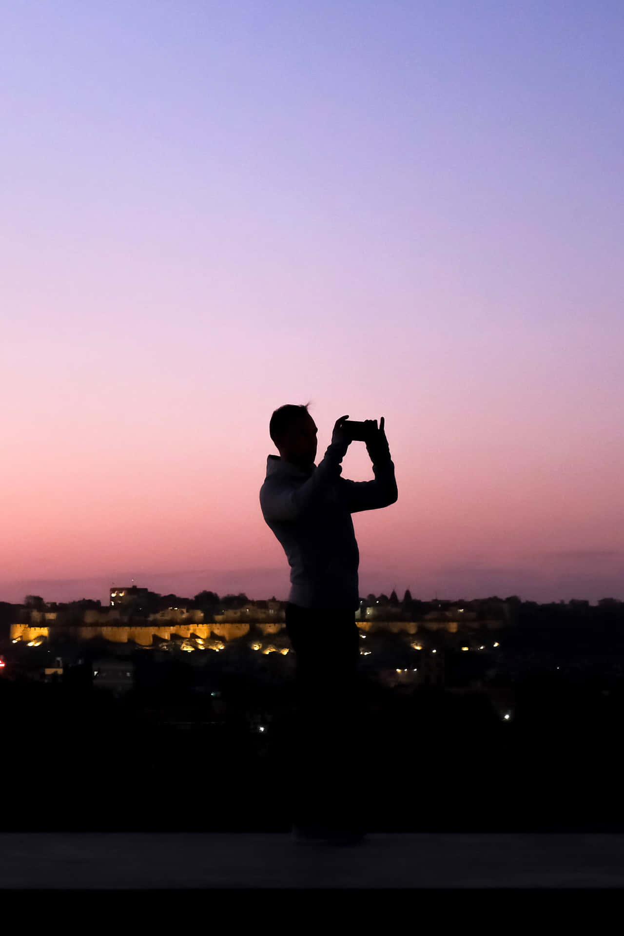 Random Person Photographing Lovely Sunset Background