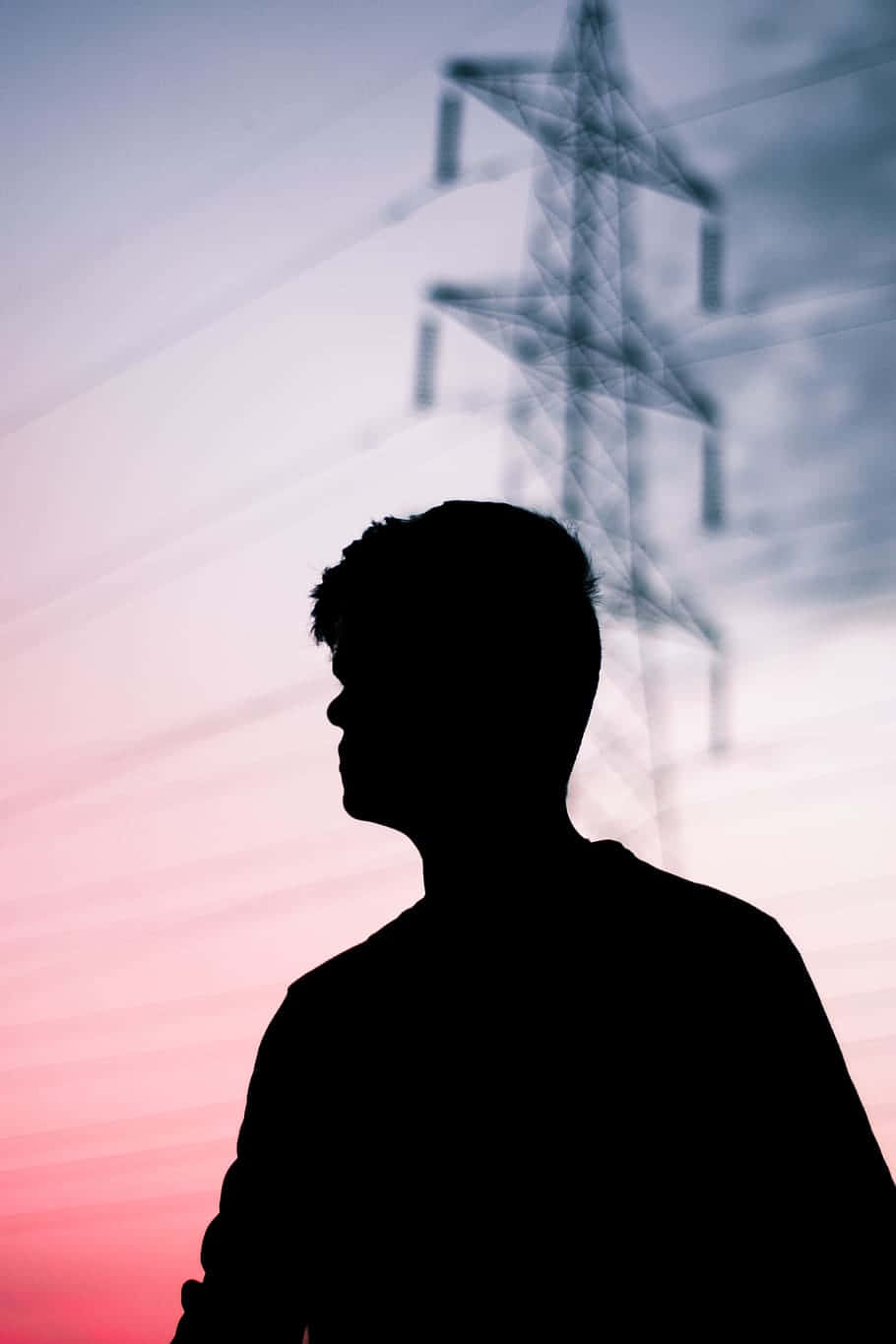 Random Person Silhouette And Transmission Tower Background