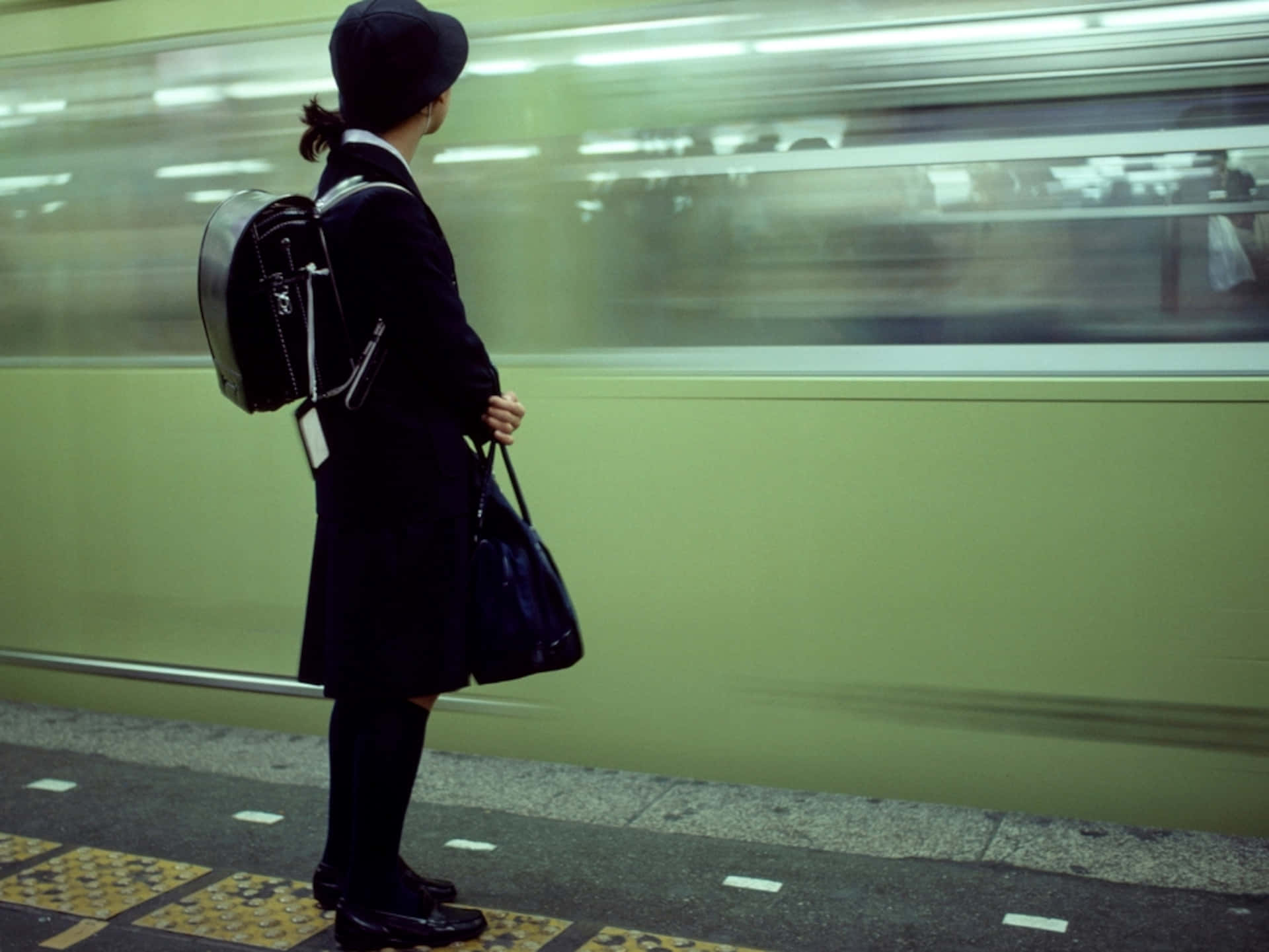 Random Person Waiting For Train Background