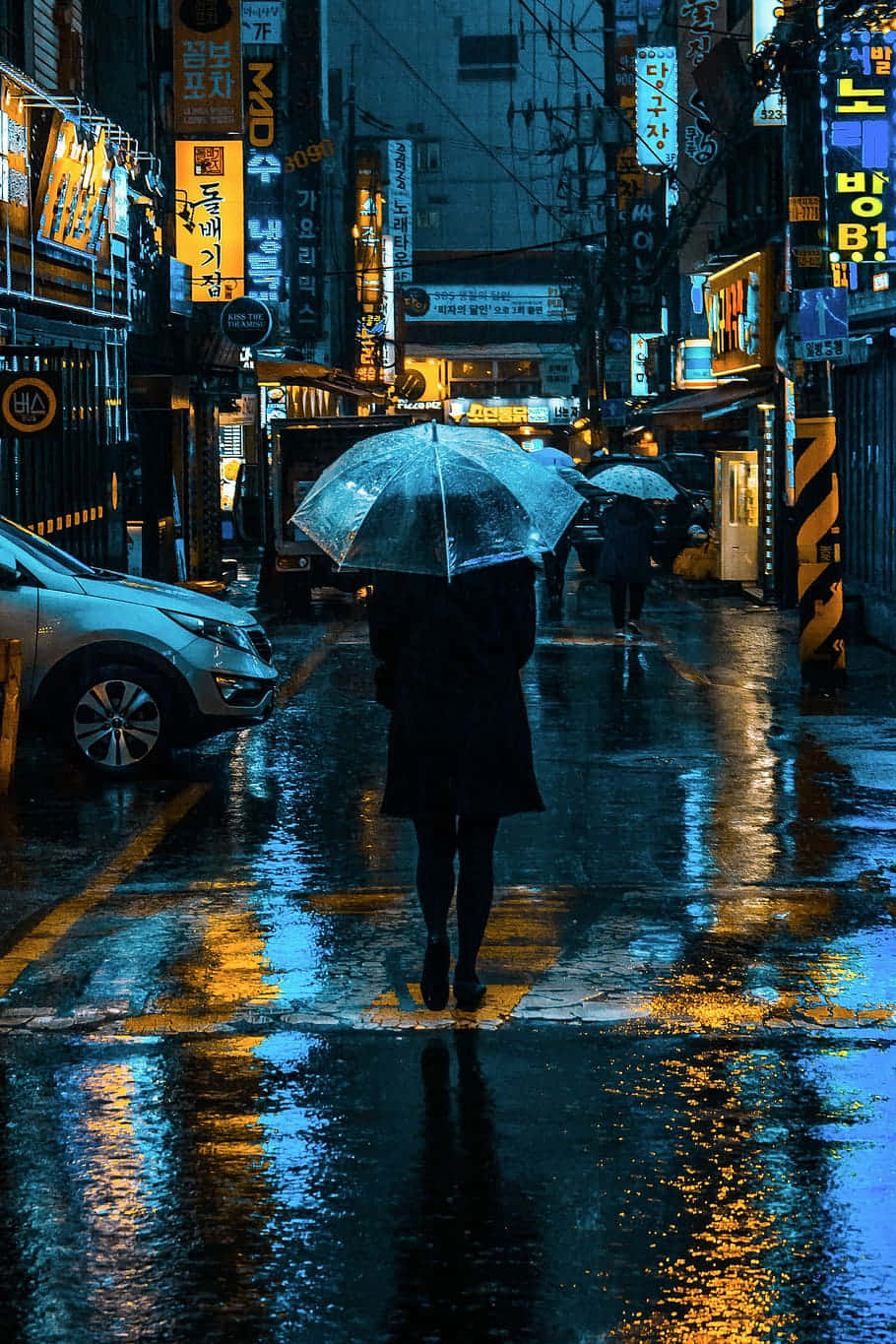 Random Person Walking On A Rainy Day Background