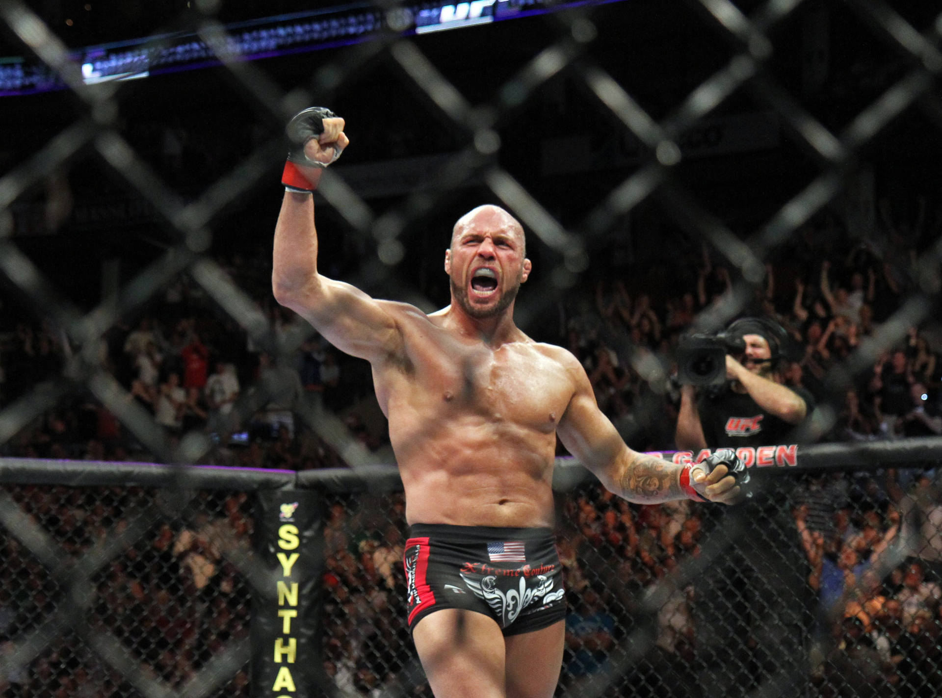 Randy Couture Fist Pump Background