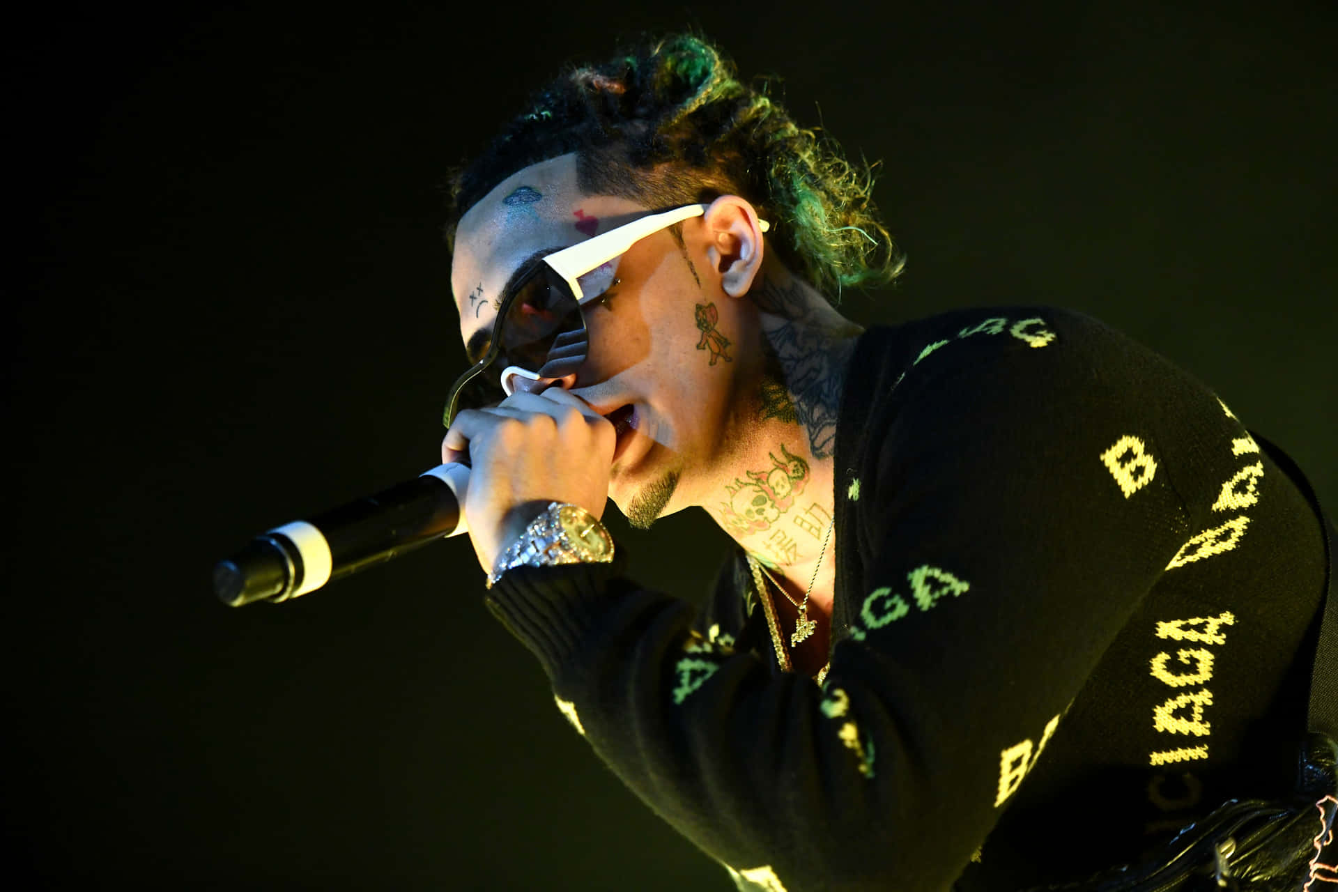 Rap Star Lil Pump Performing On Stage Background