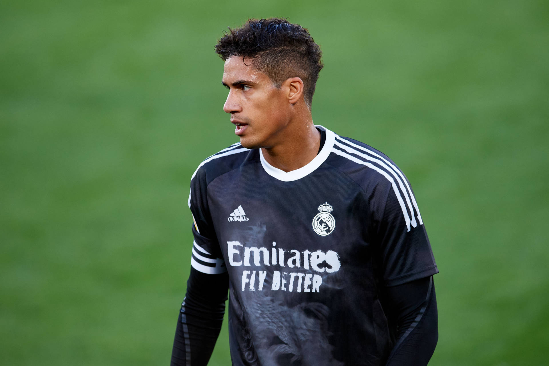 Raphael Varane Black Uniform Background