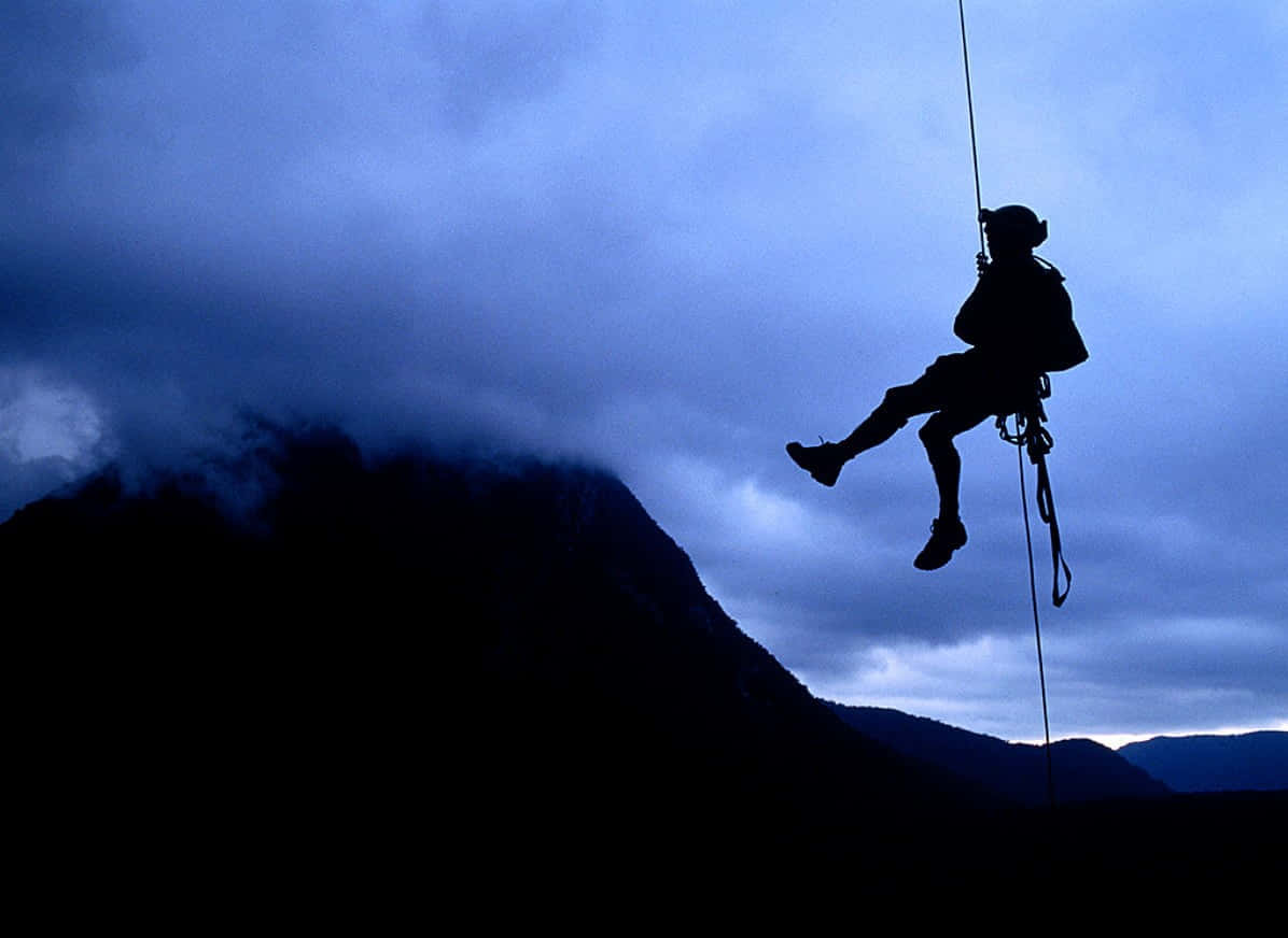 Rappelling Adventure Silhouette Background