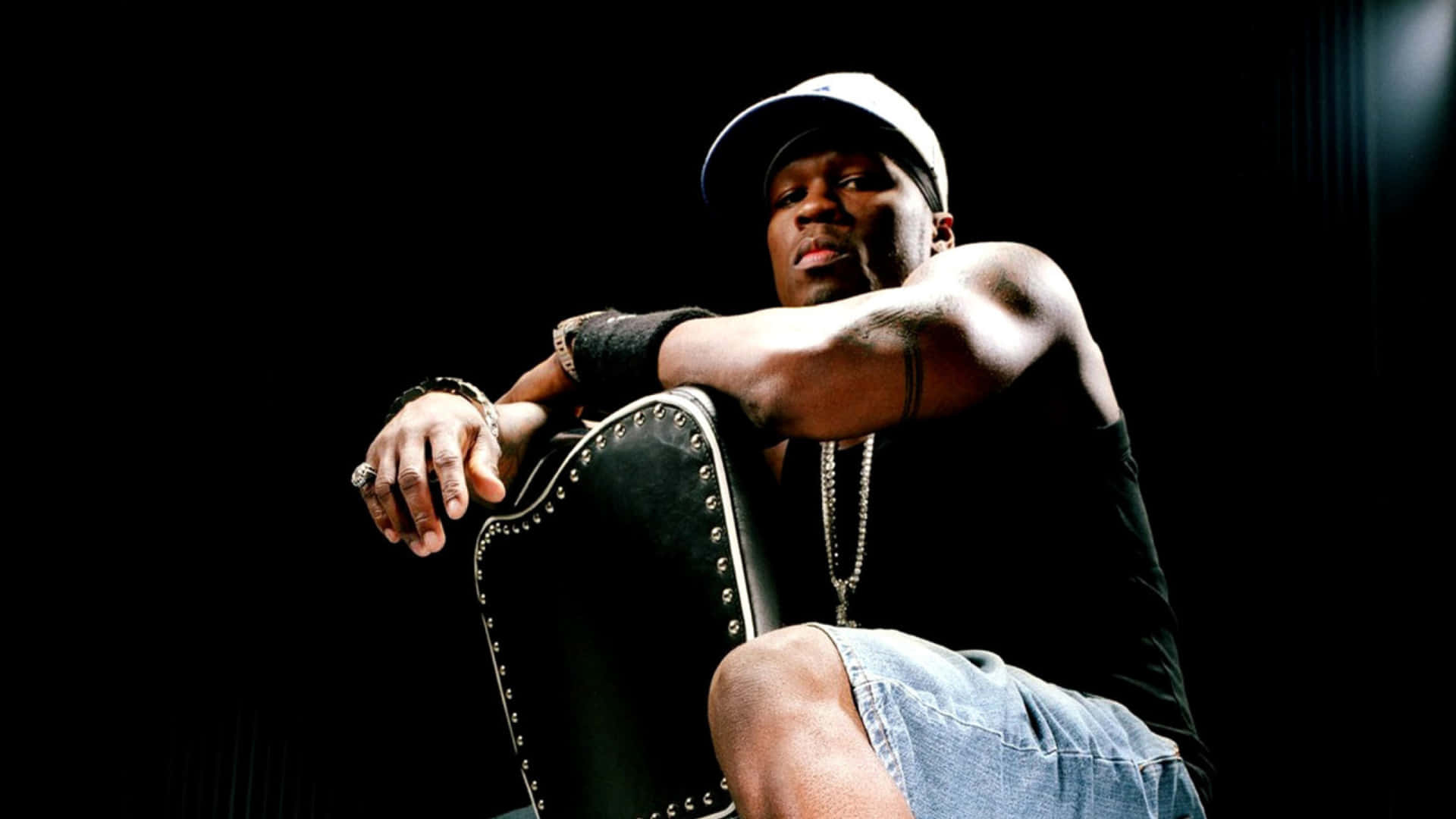 Rapper 50 Cent Exuding Swag During A Concert Background