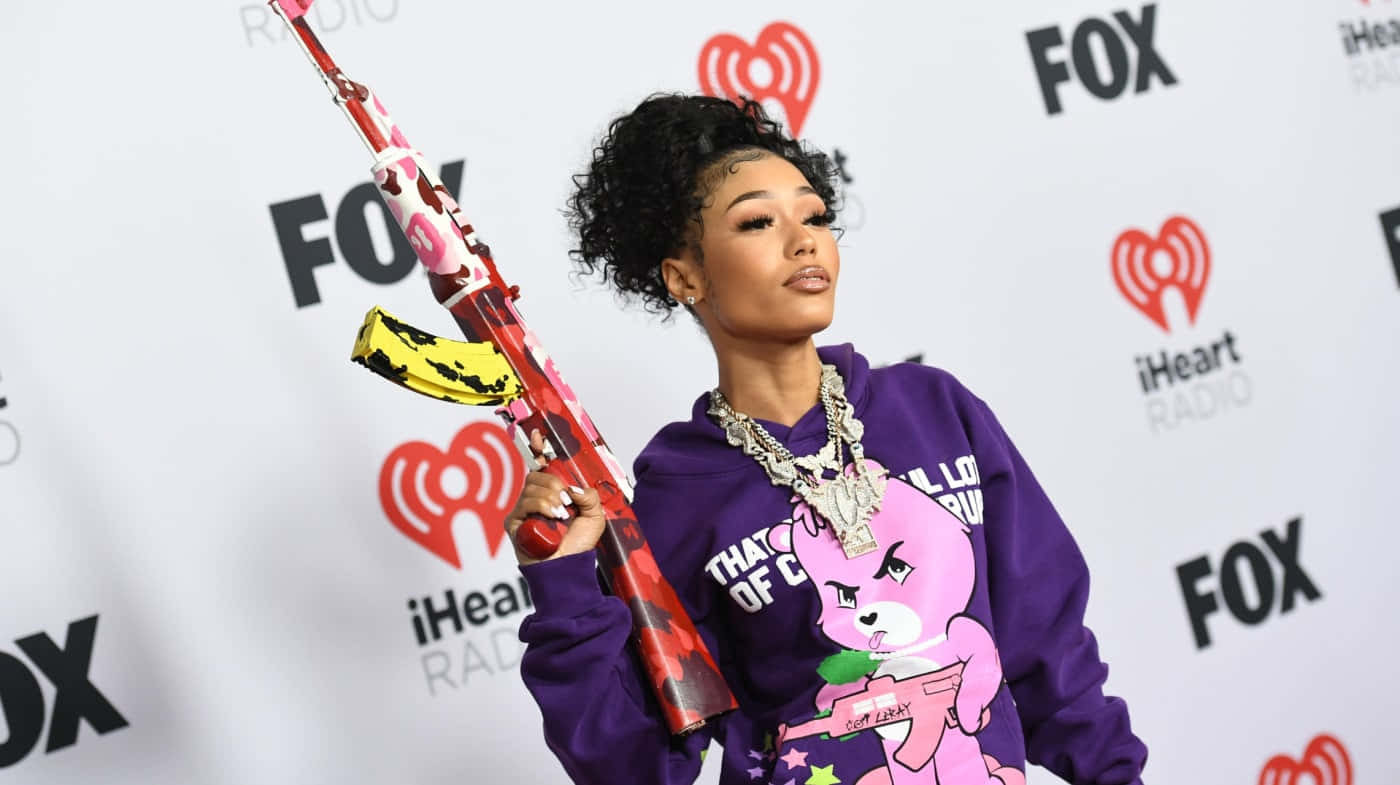 Rapper Coi Leray In A Stunning Performance Background