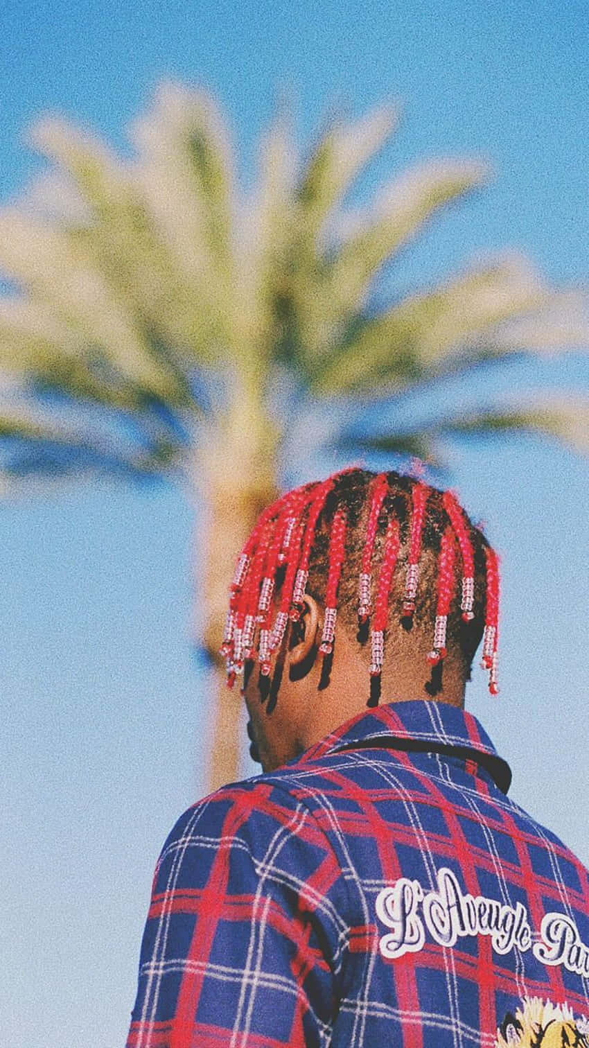 Rapper Lil Yachty Performs At The Maximas Stage At Hangout Music Festival Background