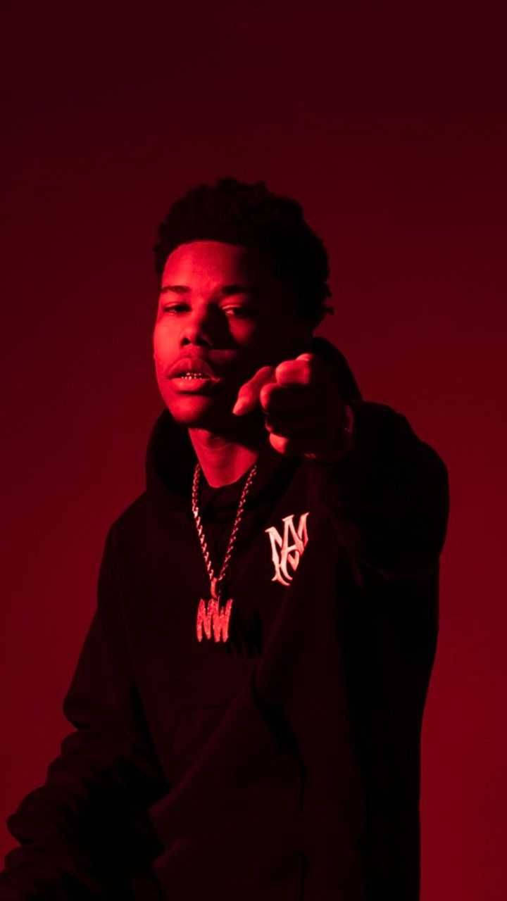 Rapper Nardo Wick Red Light Portrait Background