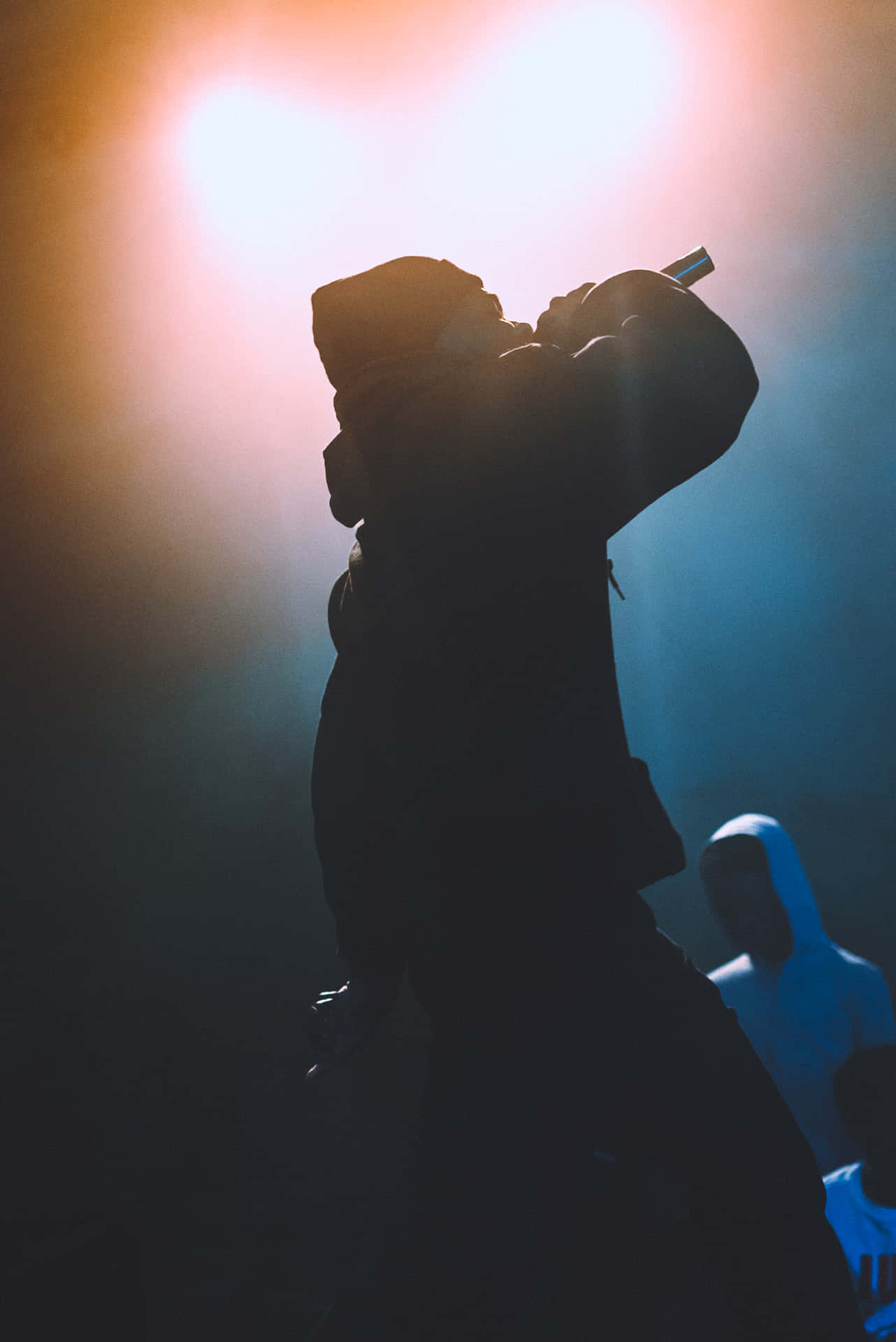 Rapper Pfp With Dramatic Lighting Onstage Background