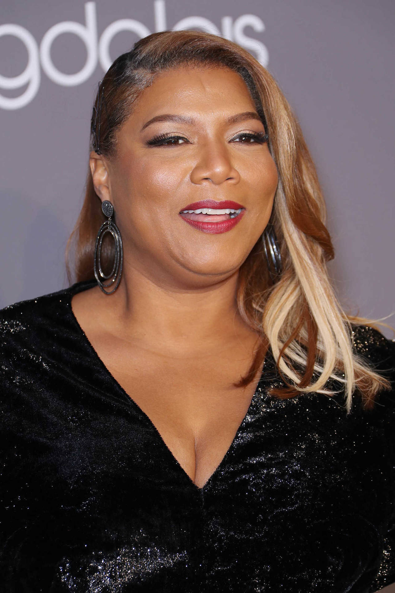 Rapper Queen Latifah Background