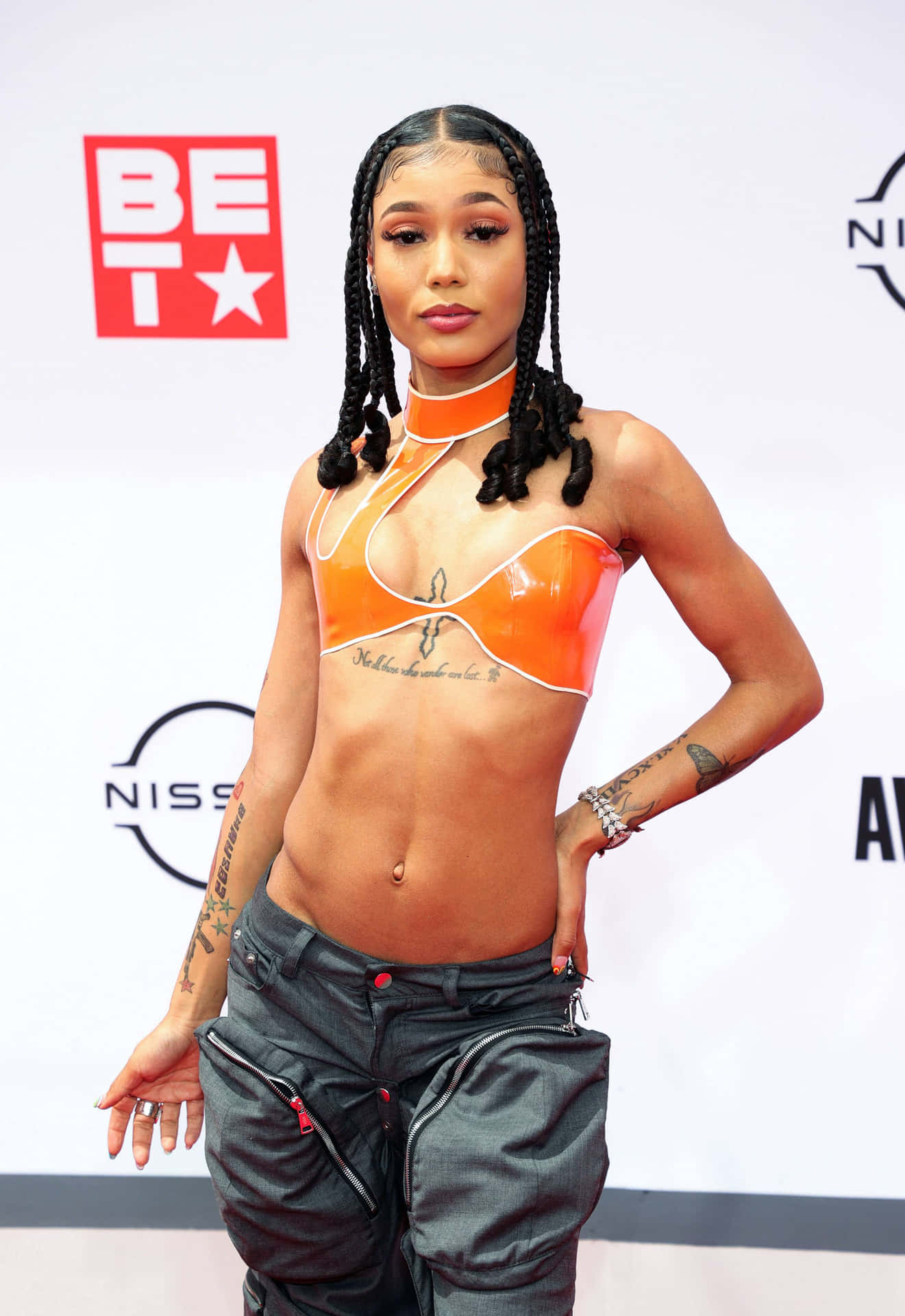 Rapper, Songwriter, And Influencer Coi Leray Background