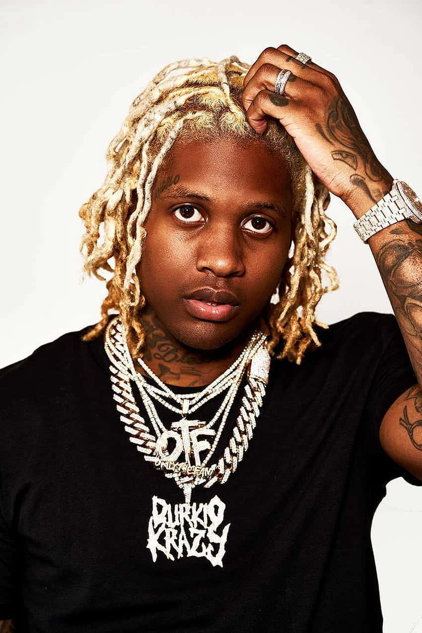 Rapper_with_ Blond_ Dreads_and_ Chains