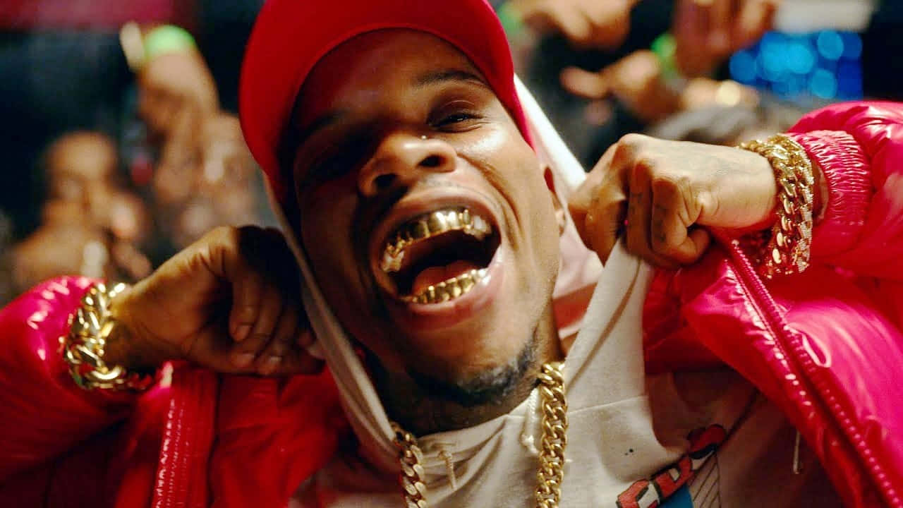 Rapper_with_ Gold_ Grill_and_ Red_ Cap.jpg Background