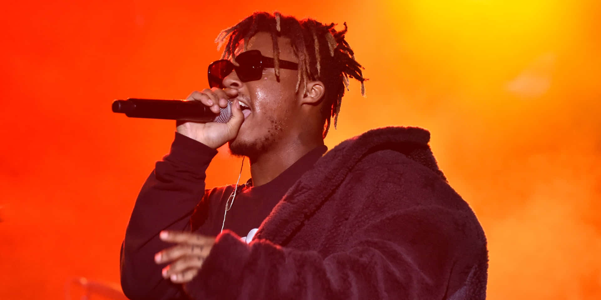 Rapper With Posthumous Albums Background