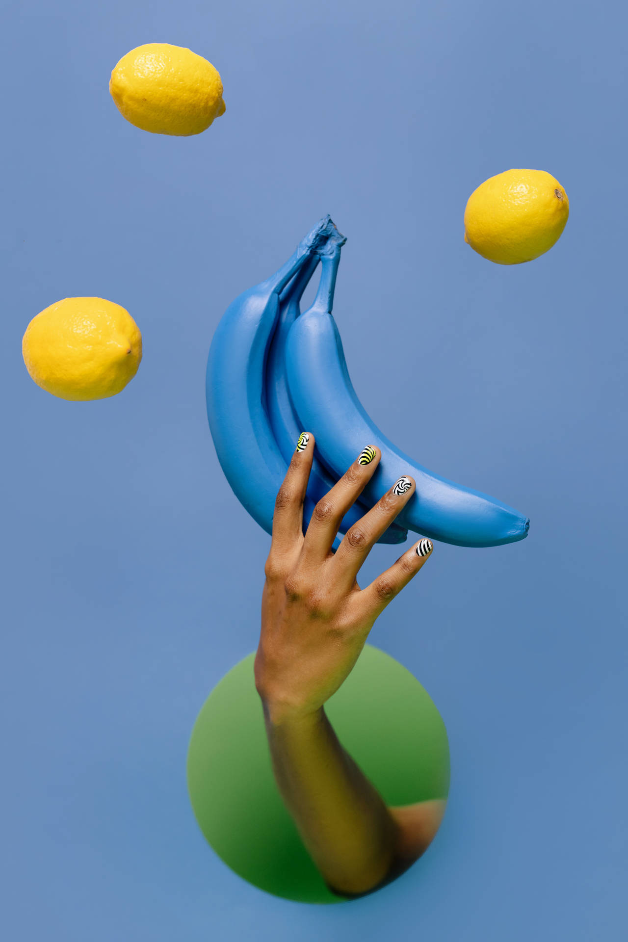 Rare Blue Bananas And Lemons Artistic Display Background