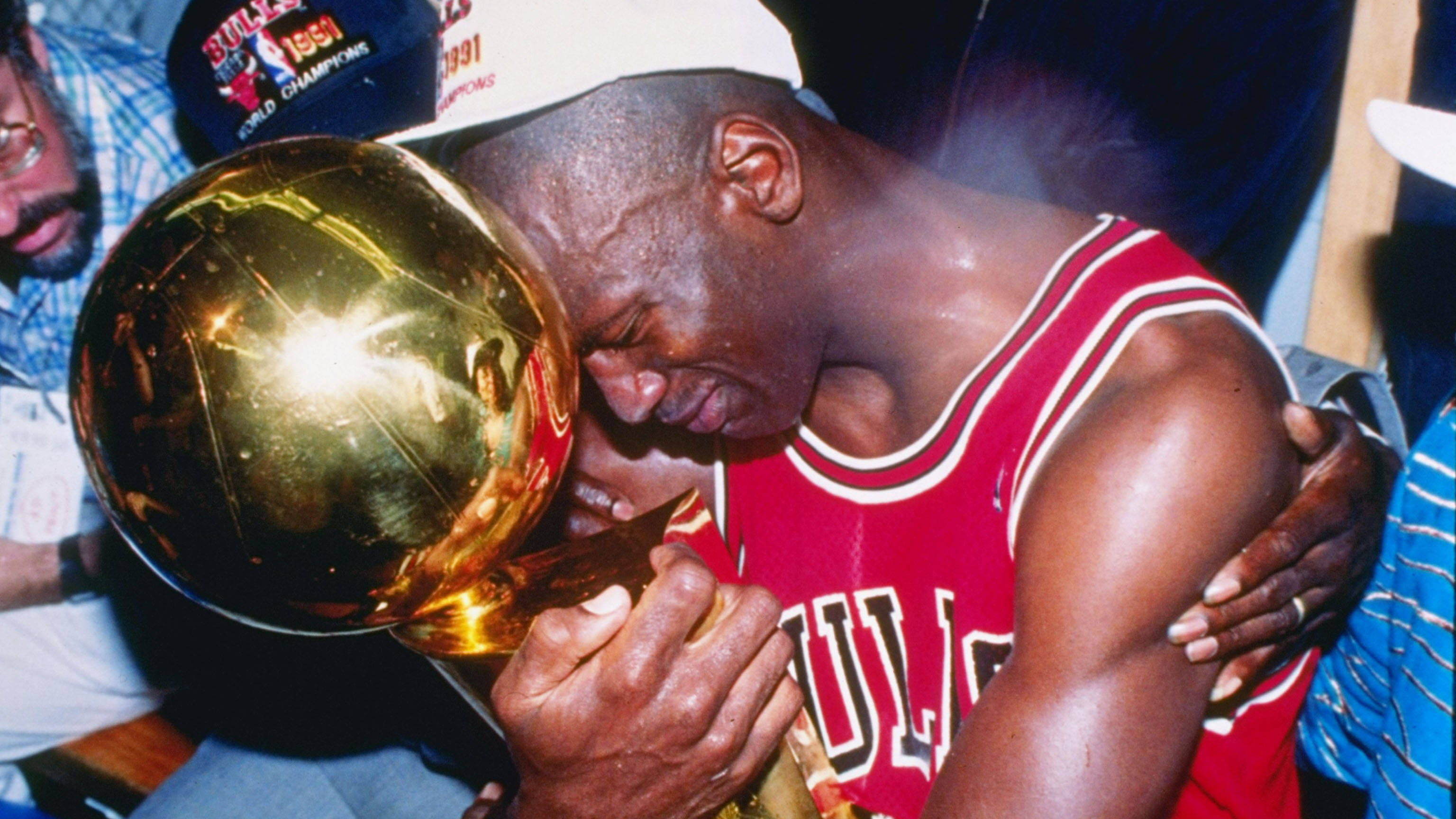 Rare Cool Emotional Jordan Holding A Trophy Background