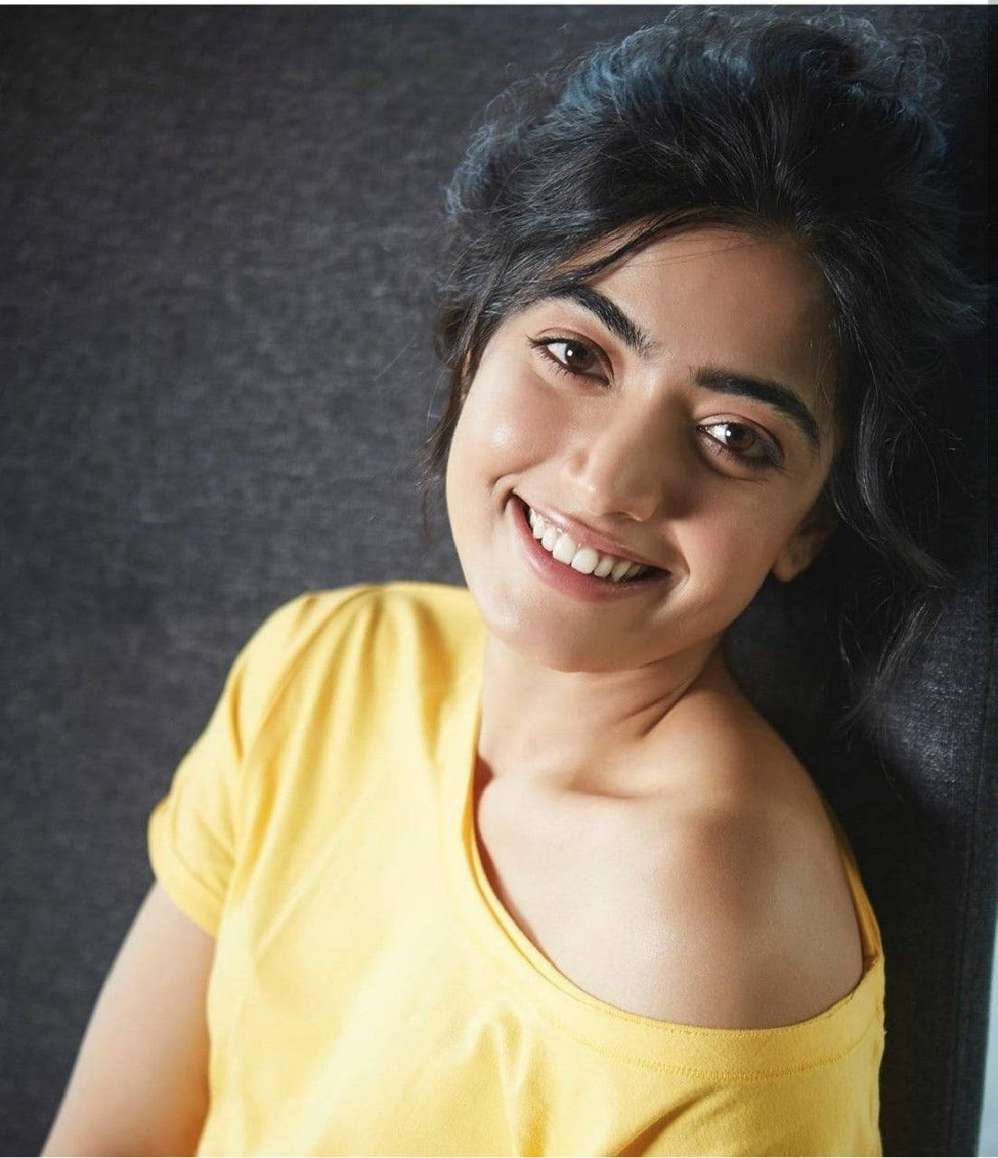 Rashmika Mandanna Hd Yellow Top Background