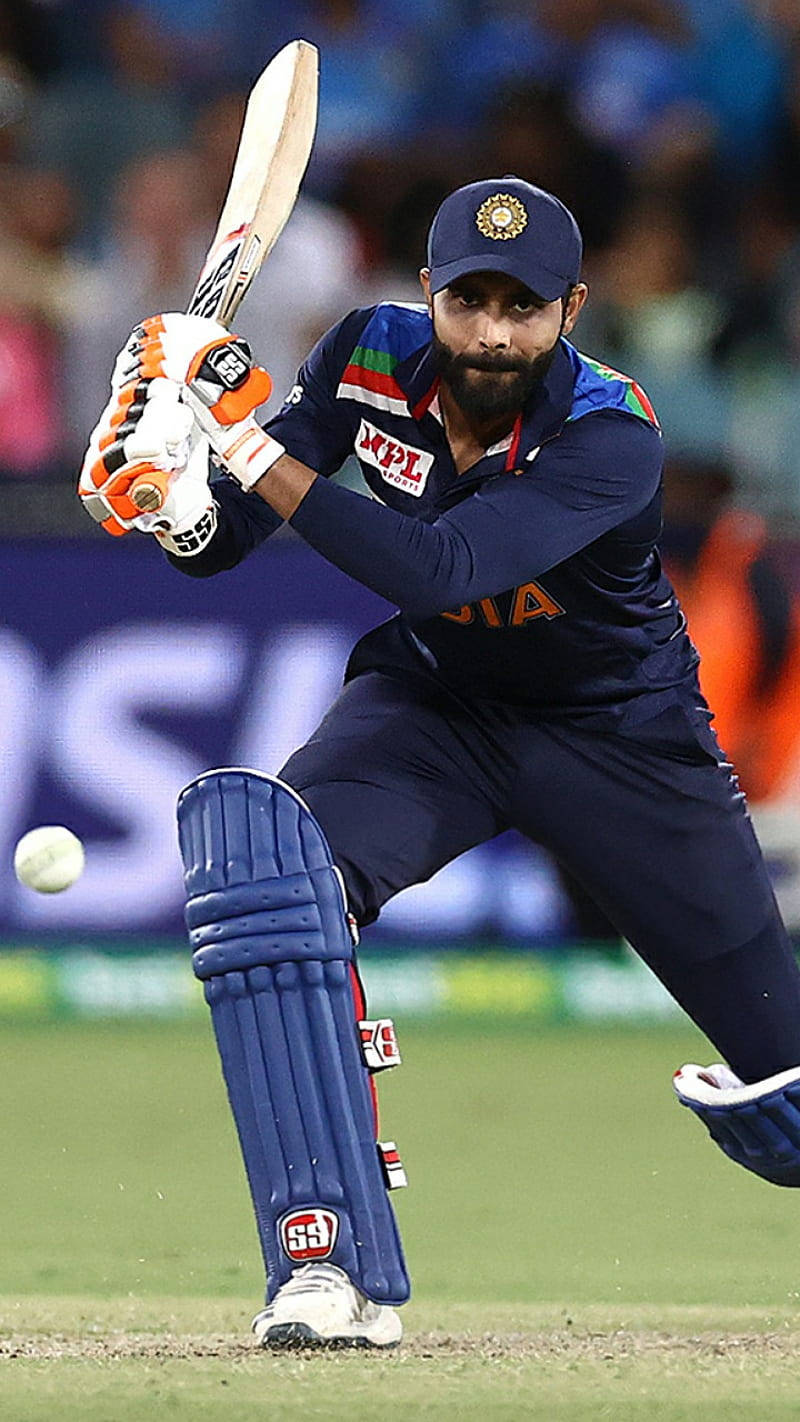 Ravindra Jadeja Batting A Ball Background