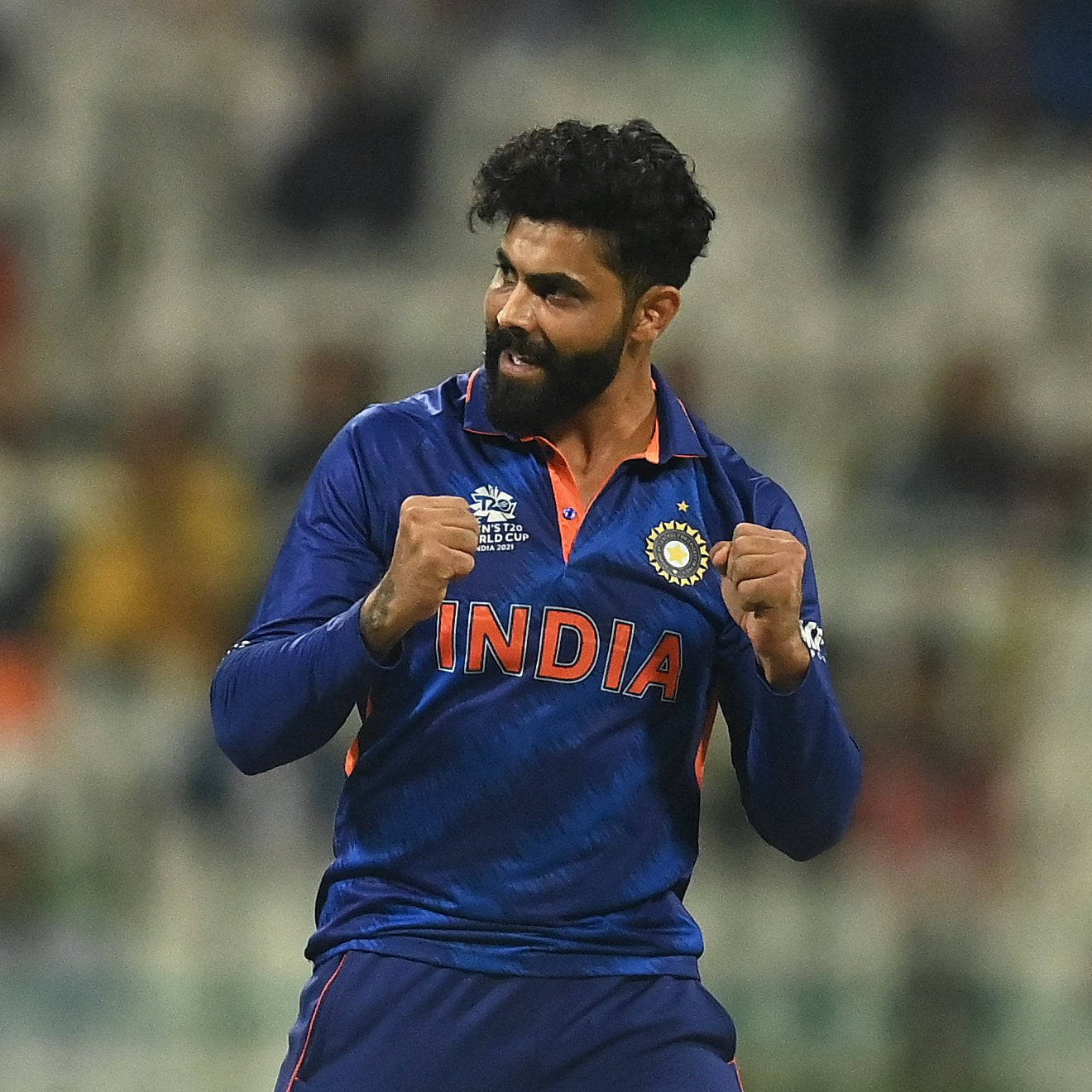 Ravindra Jadeja With Clenched Fists Background