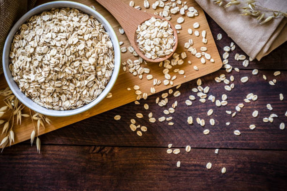 Raw Rolled Oats For Healthy Oatmeal Background