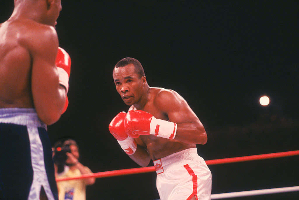 Ray Leonard Boxing Beneath Light Background