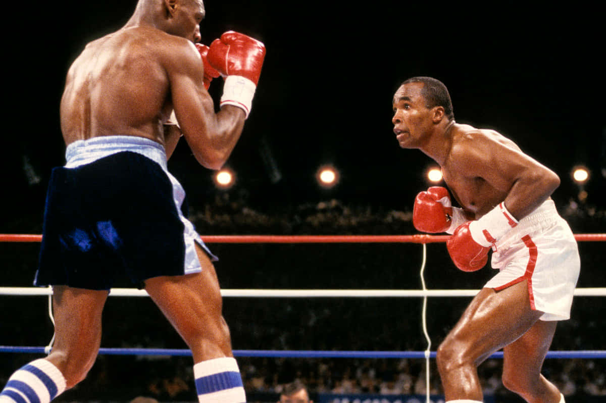 Ray Leonard Ready To Box In The Ring Background