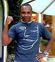 Ray Leonard Wearing A Blue Shirt Phone Background