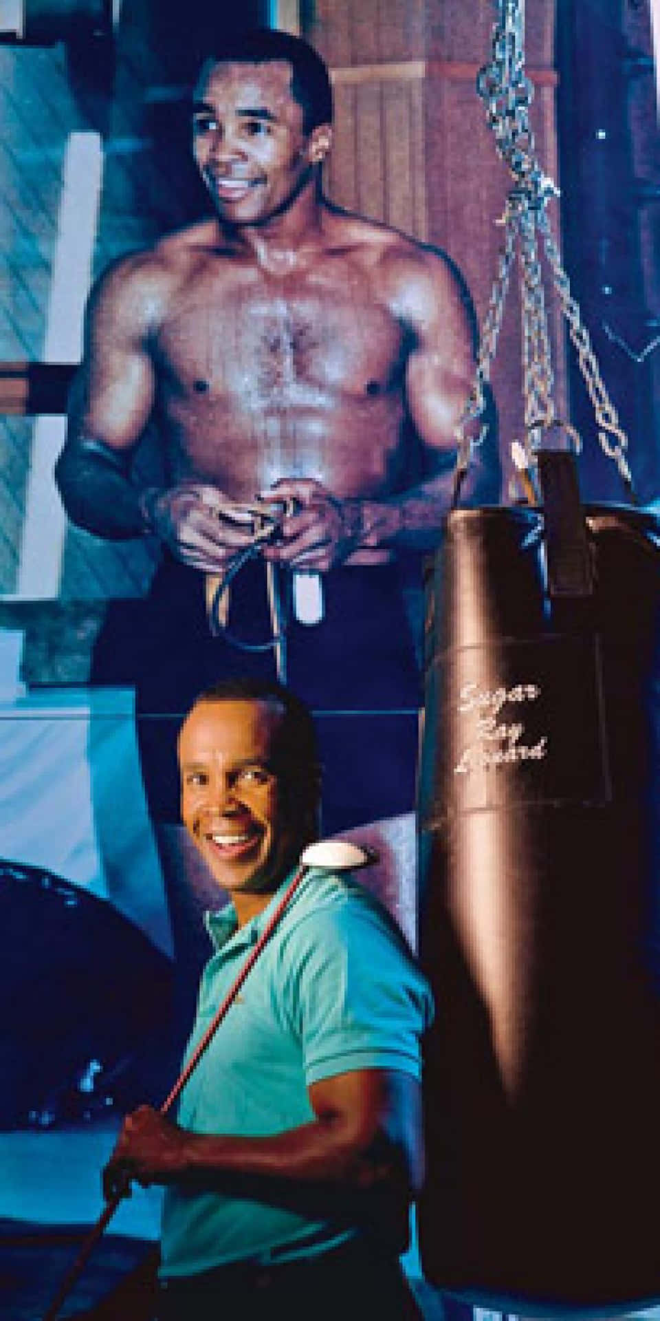 Ray Leonard With Poster Of Himself Phone Background