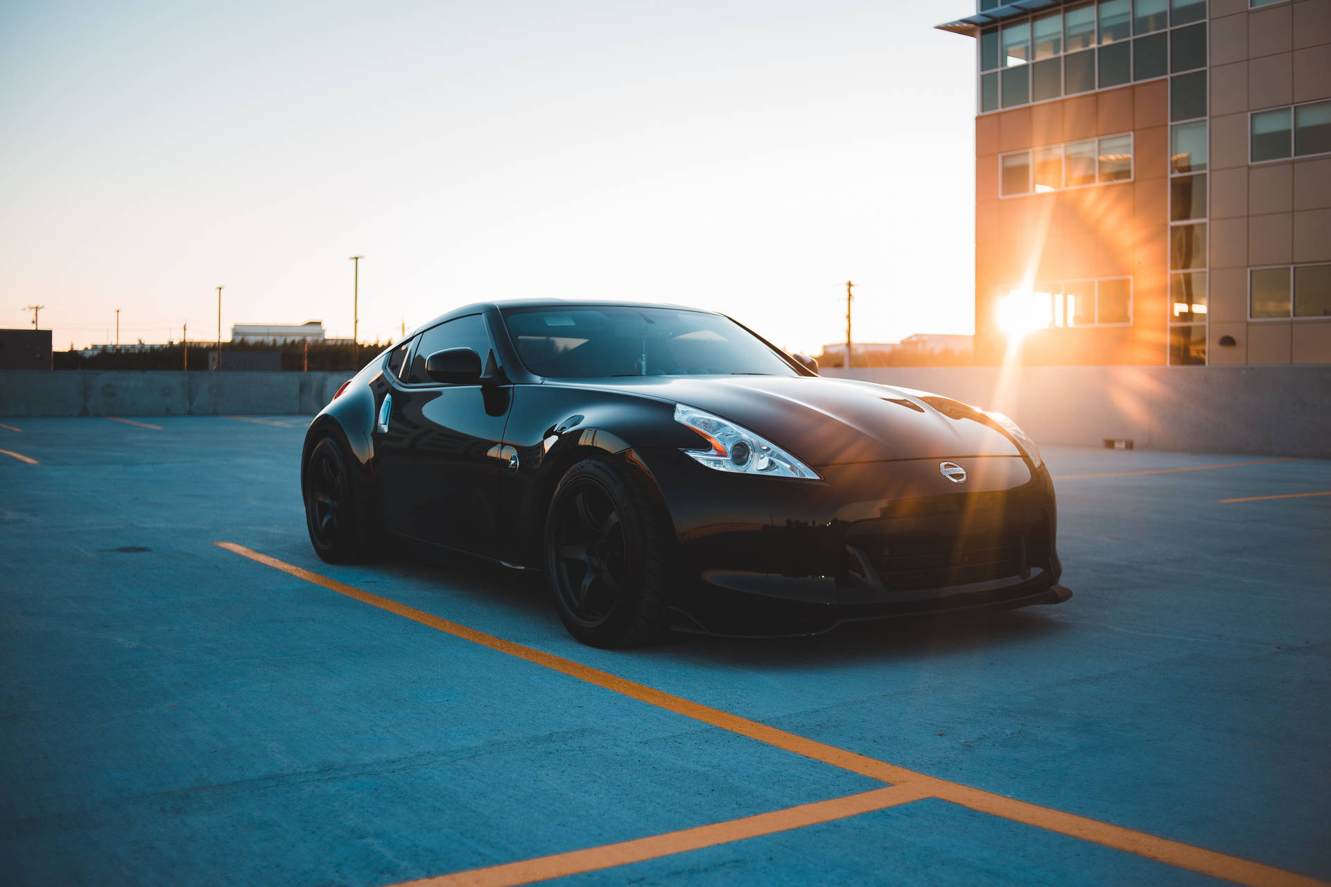 Ray Of Sunlight On Black Sports Cars Background