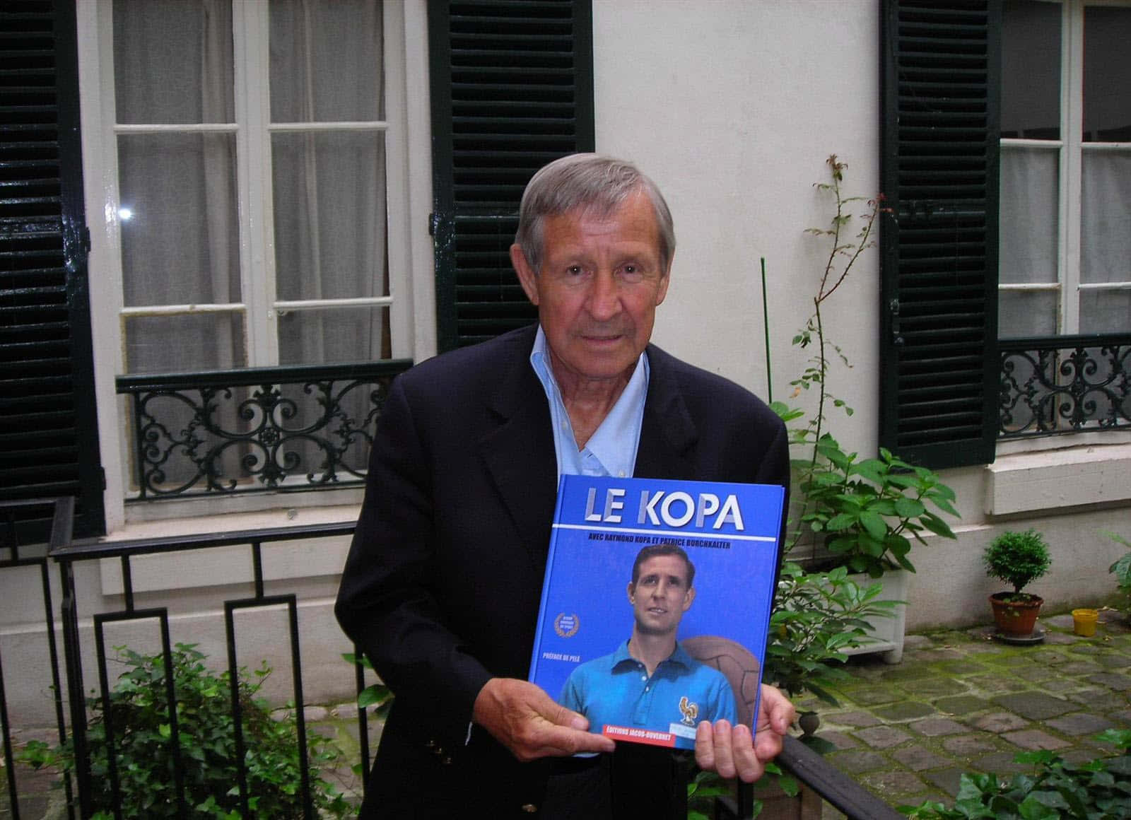 Raymond Kopa Holding Autobiography Background