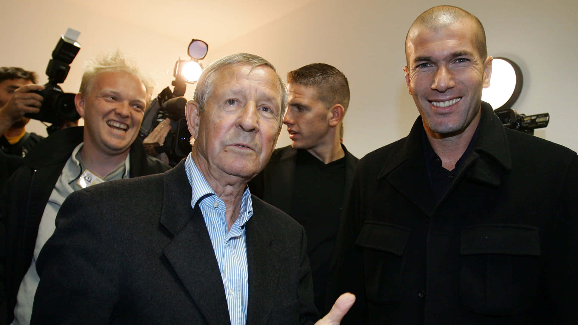 Raymond Kopaand Football Legend Smiling Background
