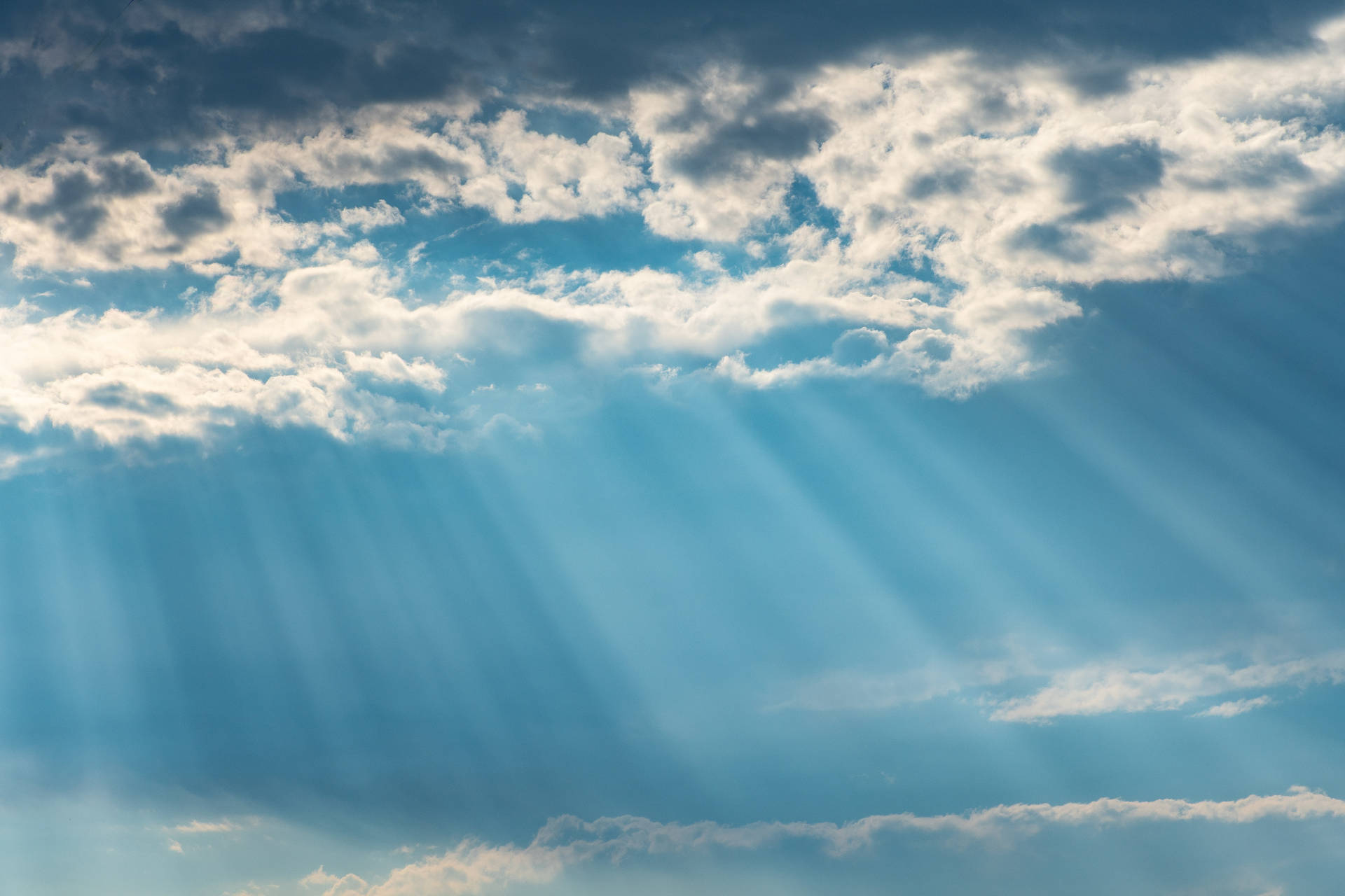 Rays Of Light From Blue Aesthetic Cloud Background